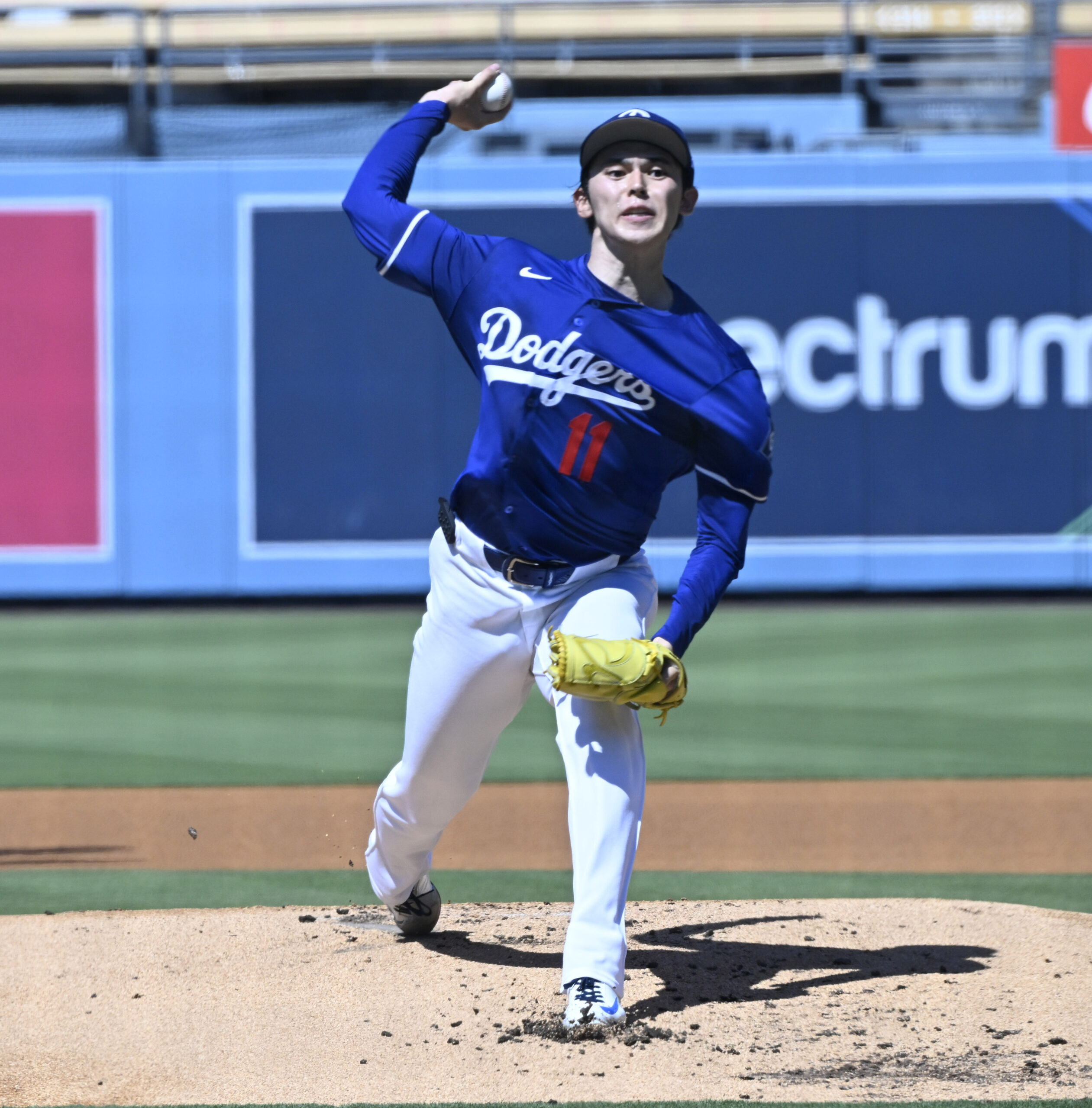 Roki Sasaki #11 of the Dodgers throws live batting practice...