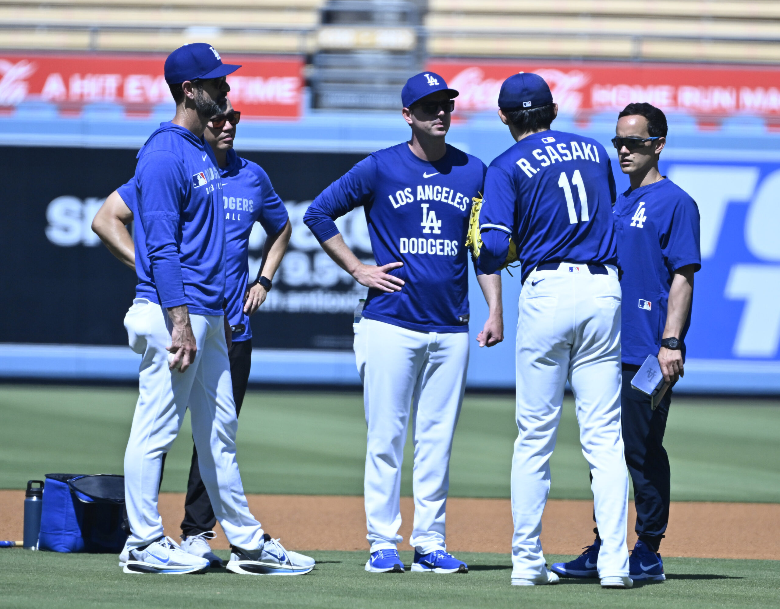 Roki Sasaki #11 of the Dodgers after throwing live batting...