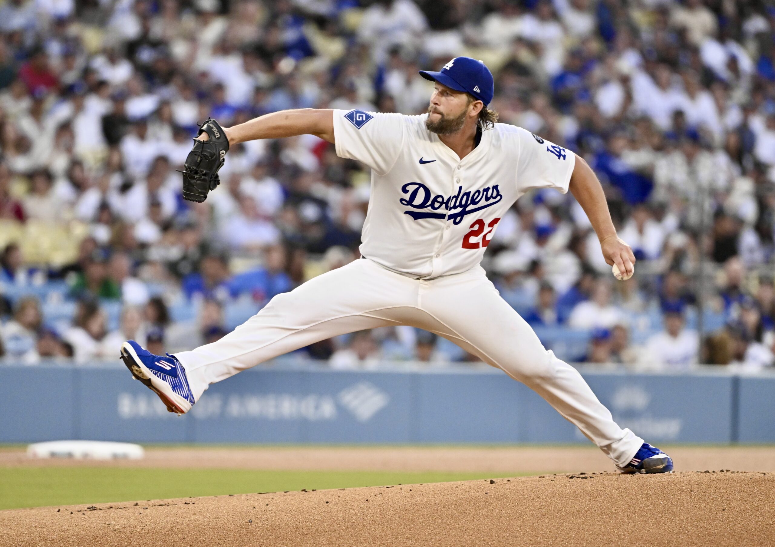 Dodgers starting pitcher Clayton Kershaw throws to the plate during...