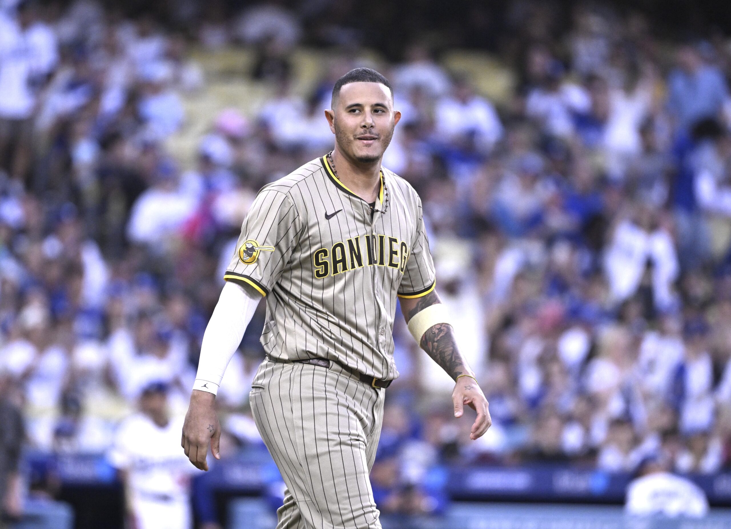 San Diego Padres star Manny Machado reacts after striking out...