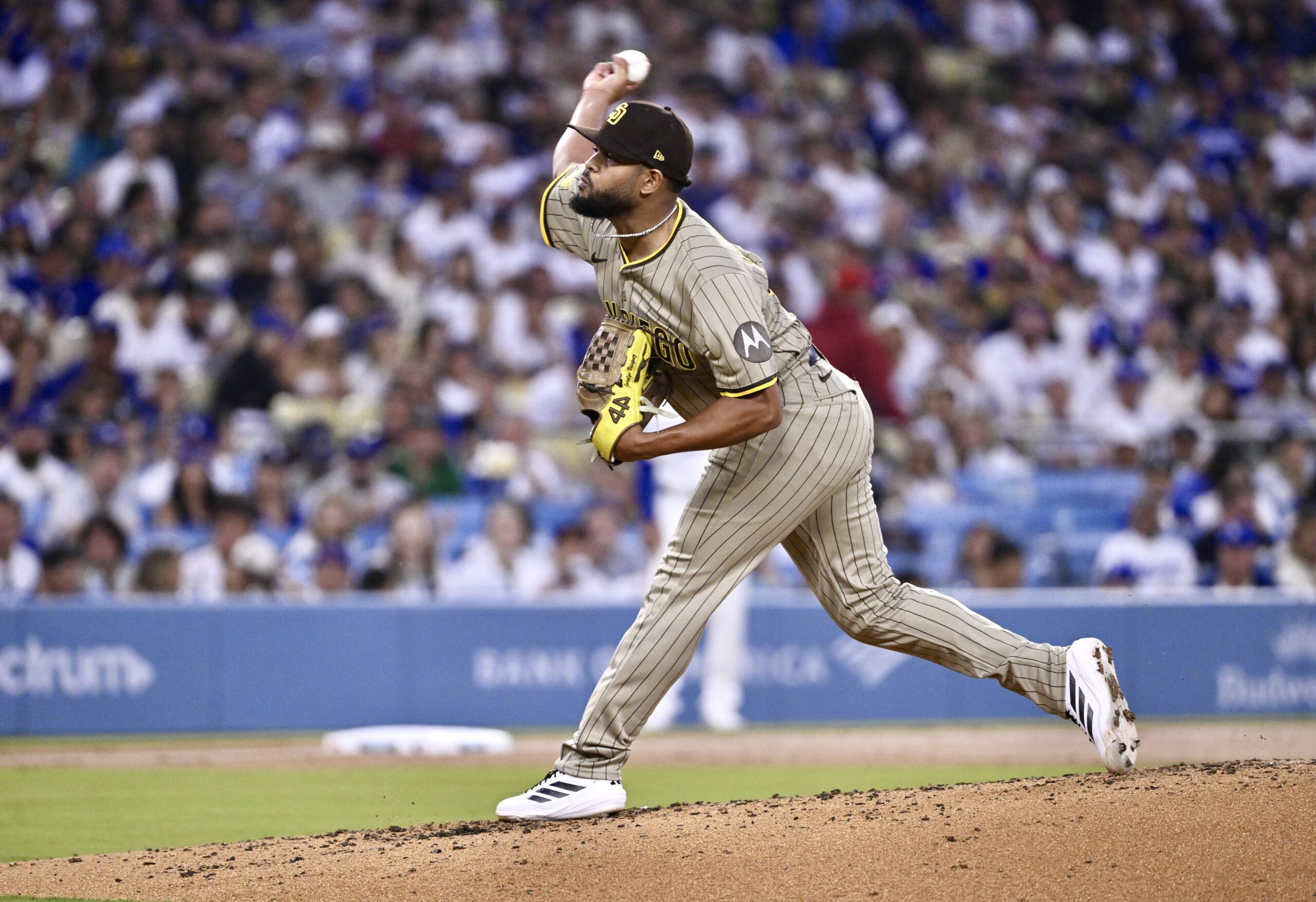 San Diego Padres relief pitcher Randy Vasquez throws to the...
