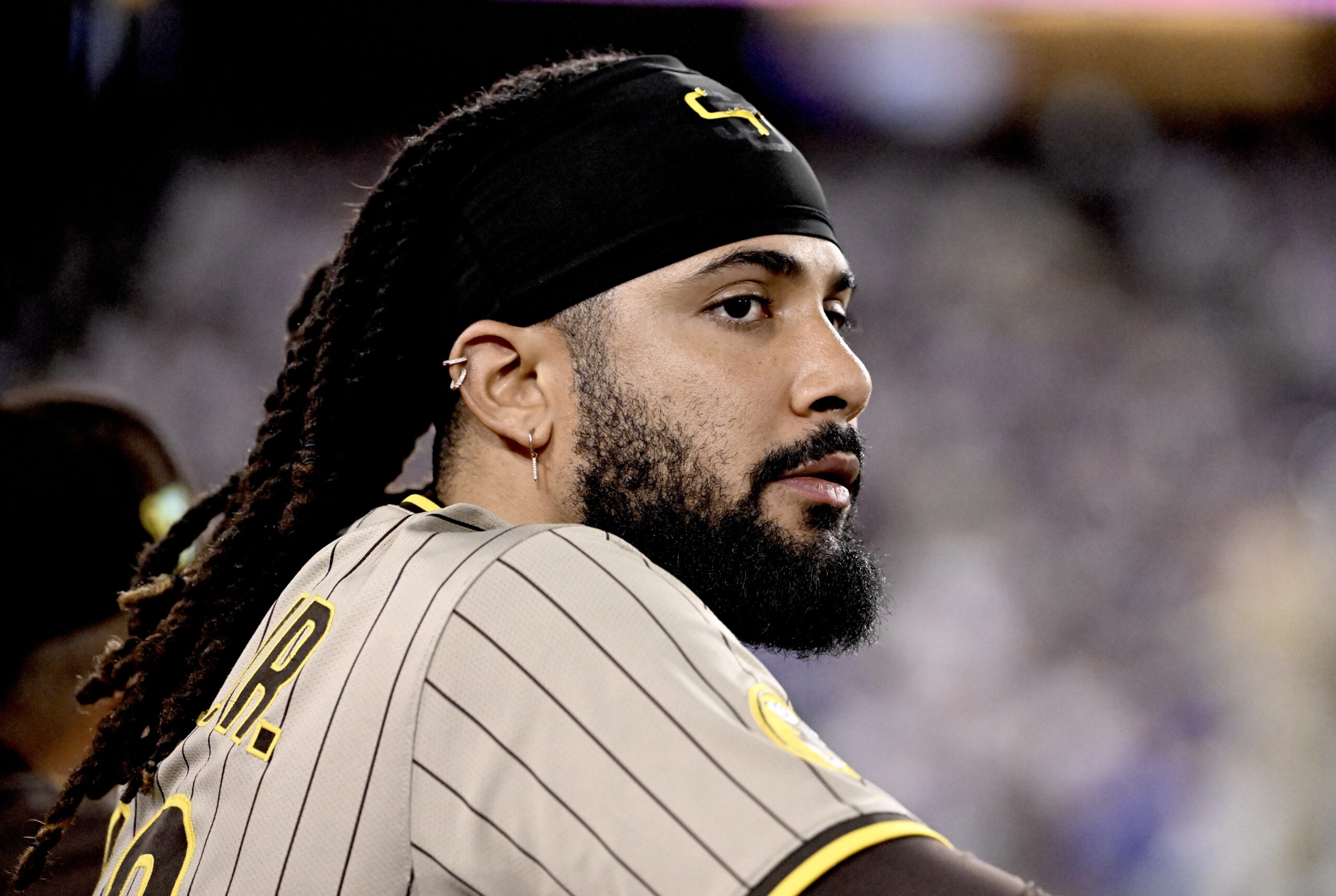 San Diego Padres star Fernando Tatis Jr. looks on from...