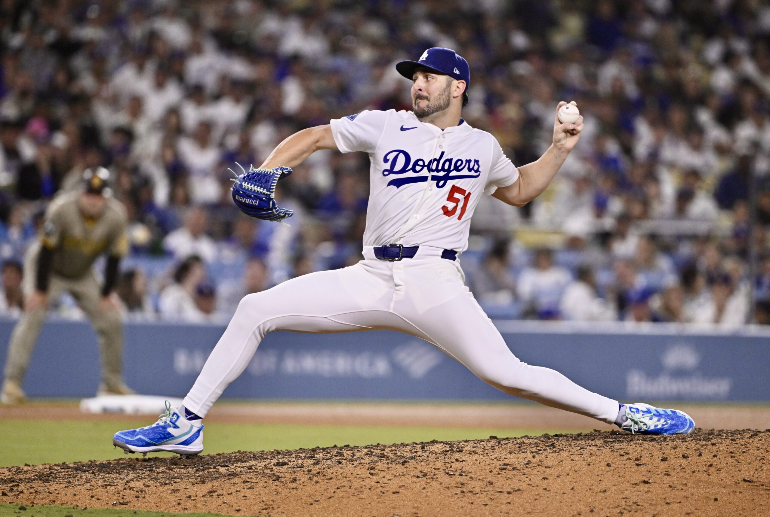 Dodgers relief pitcher Alex Vesia throws to the plate during...