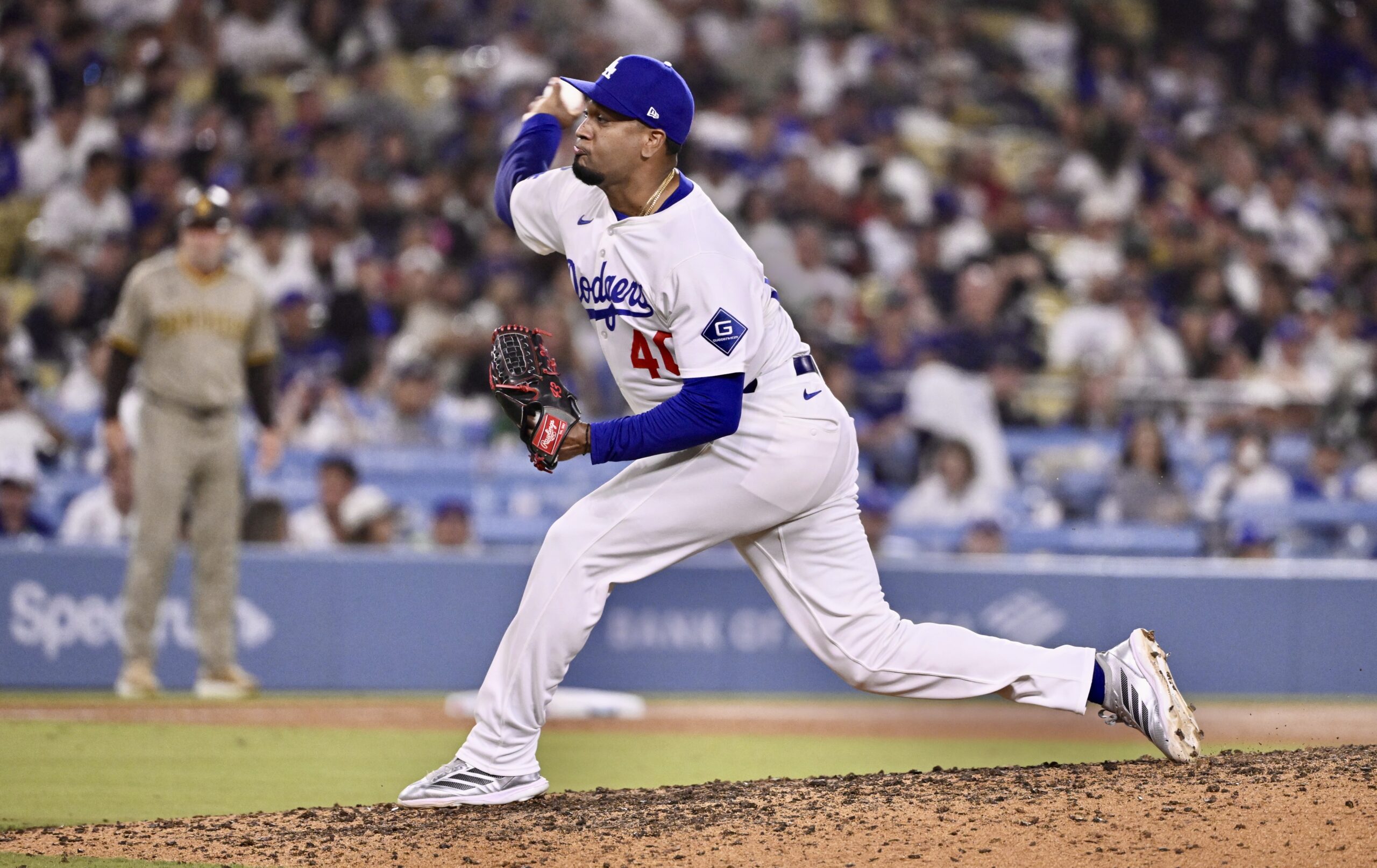 Dodgers relief pitcher Alexis Diaz throws to the plate during...