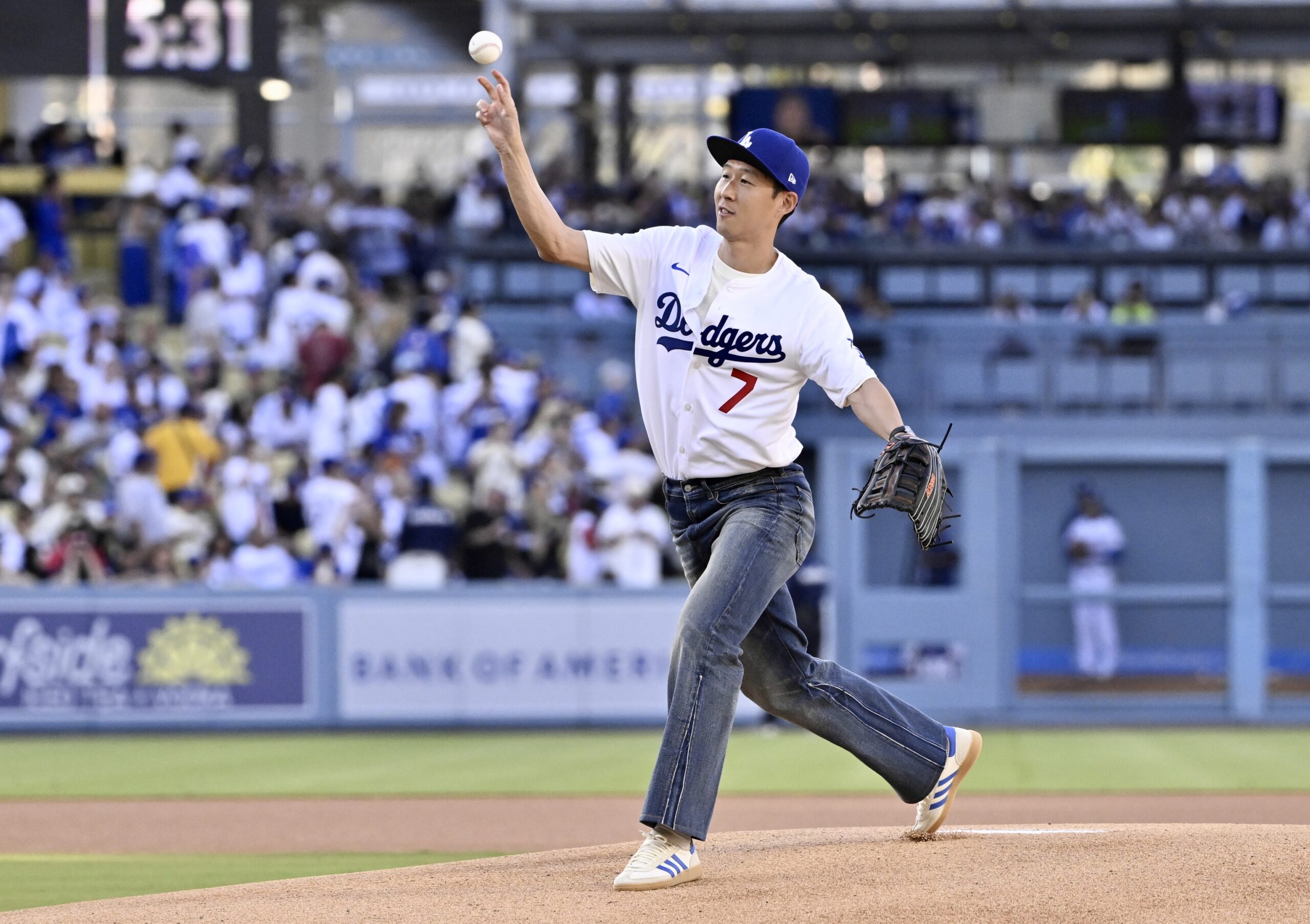 LAFC soccer player Son Heung-min throws out a ceremonial first...