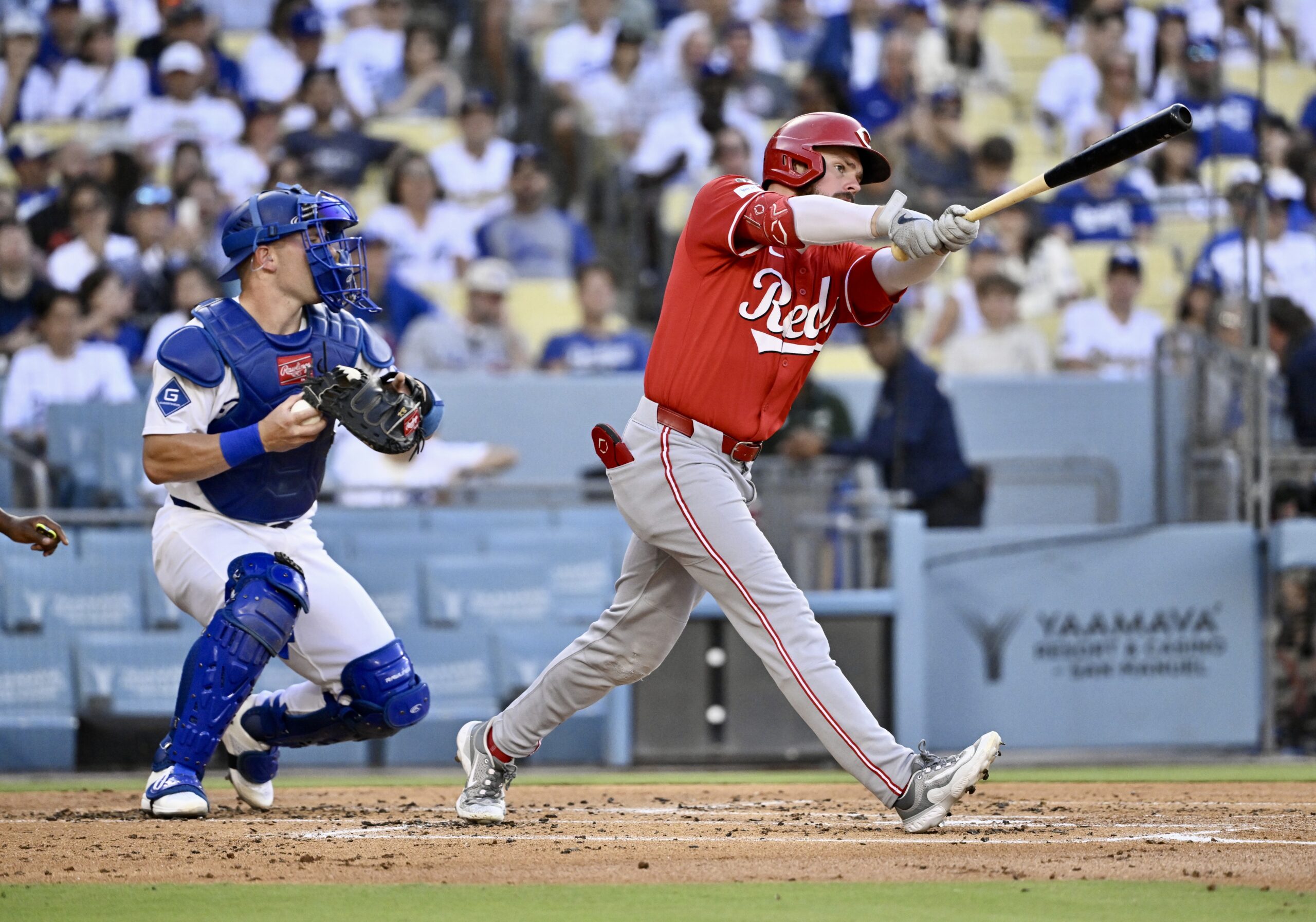 The Cincinnati Reds’ Gavin Lux strikes out swinging during the...