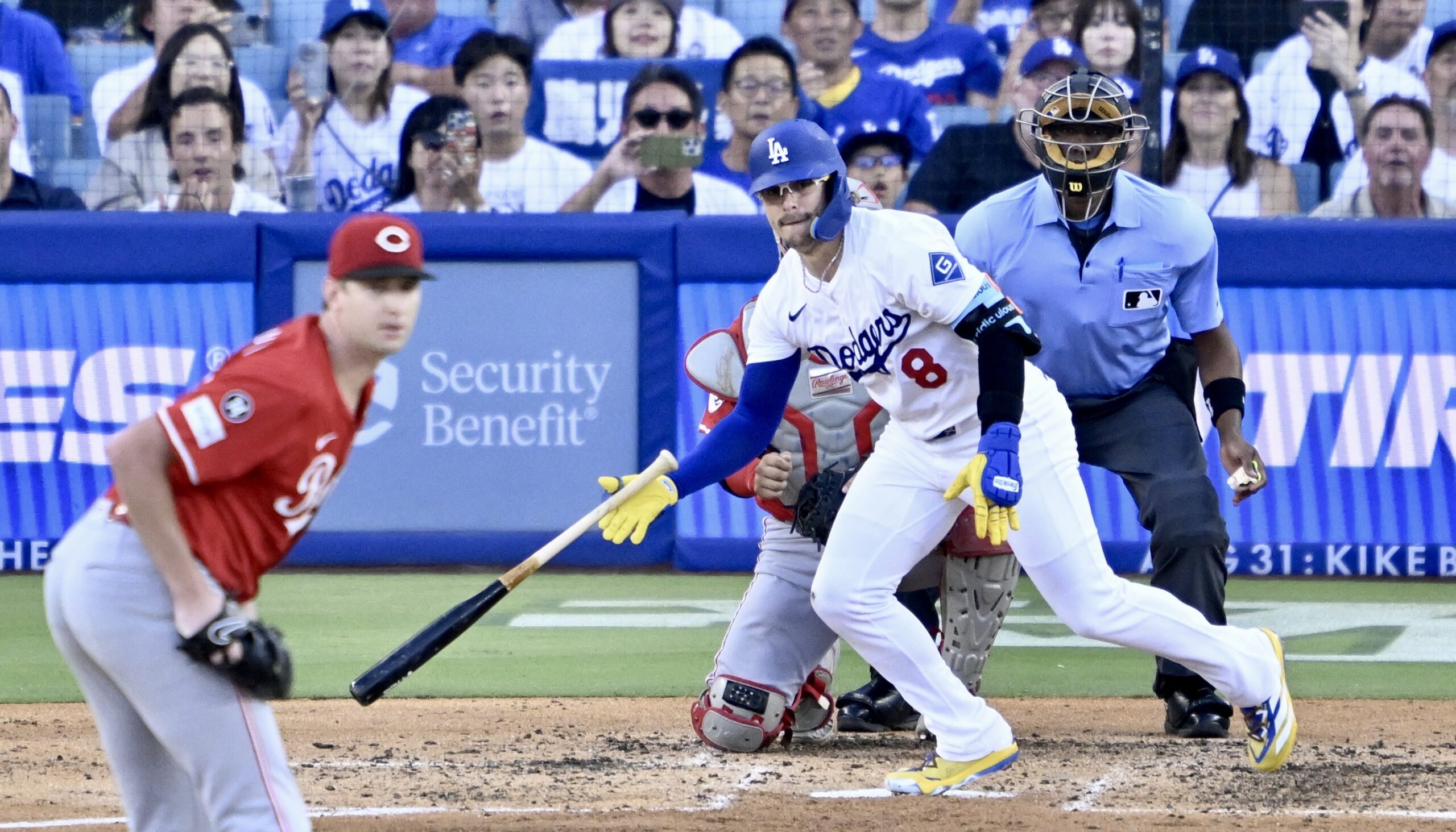 The Dodgers’ Kike Hernandez begins to run after hitting a...