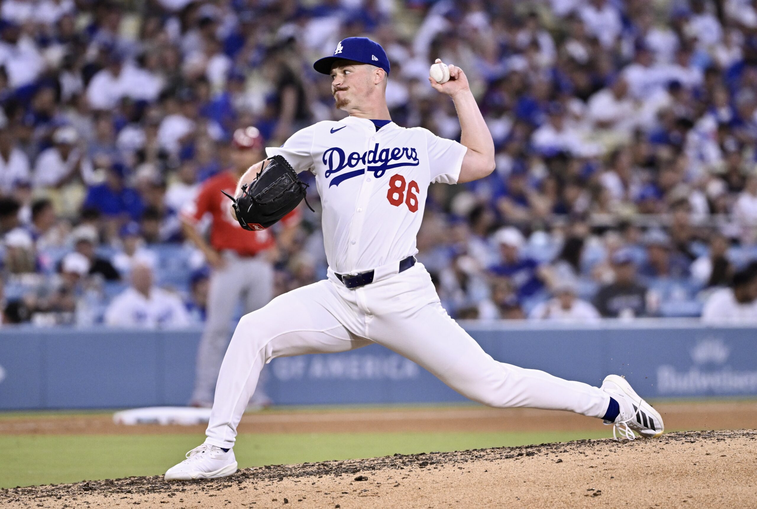 Dodgers relief pitcher Jack Dreyer throws to the plate during...