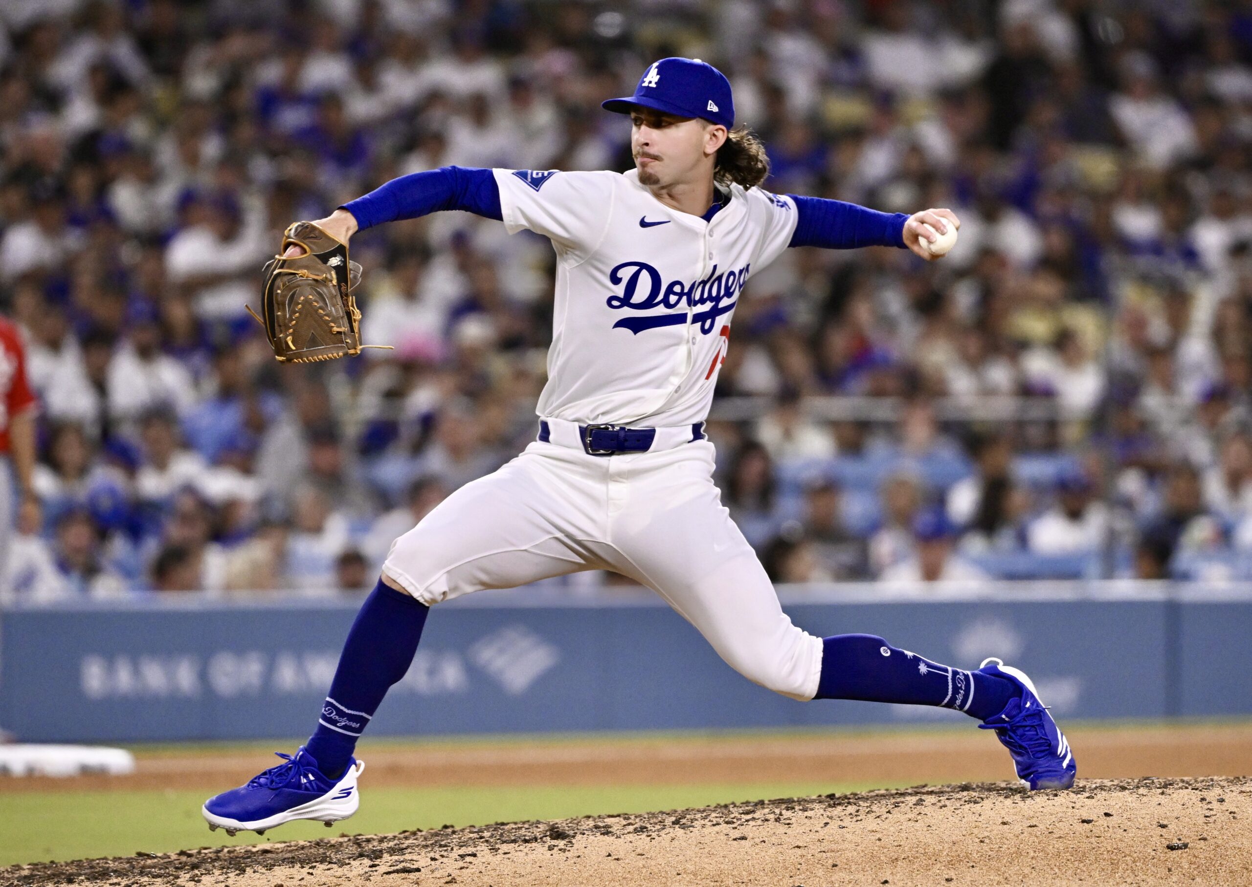 Dodgers relief pitcher Justin Wrobleski throws to the plate during...