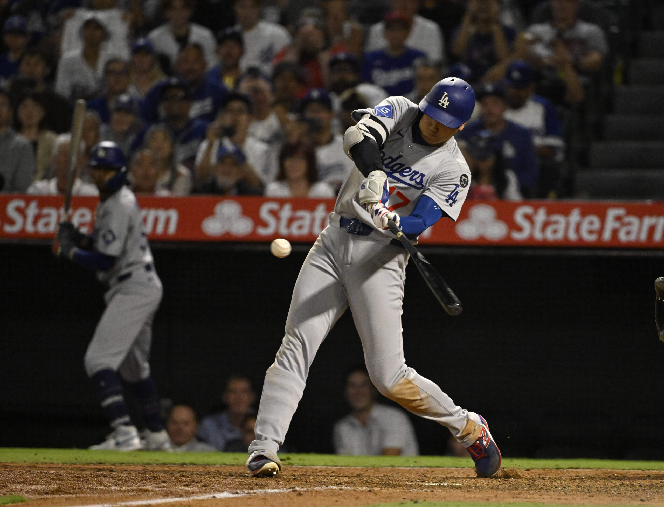 Dodgers star Shohei Ohtani hits a go-ahead solo home run...
