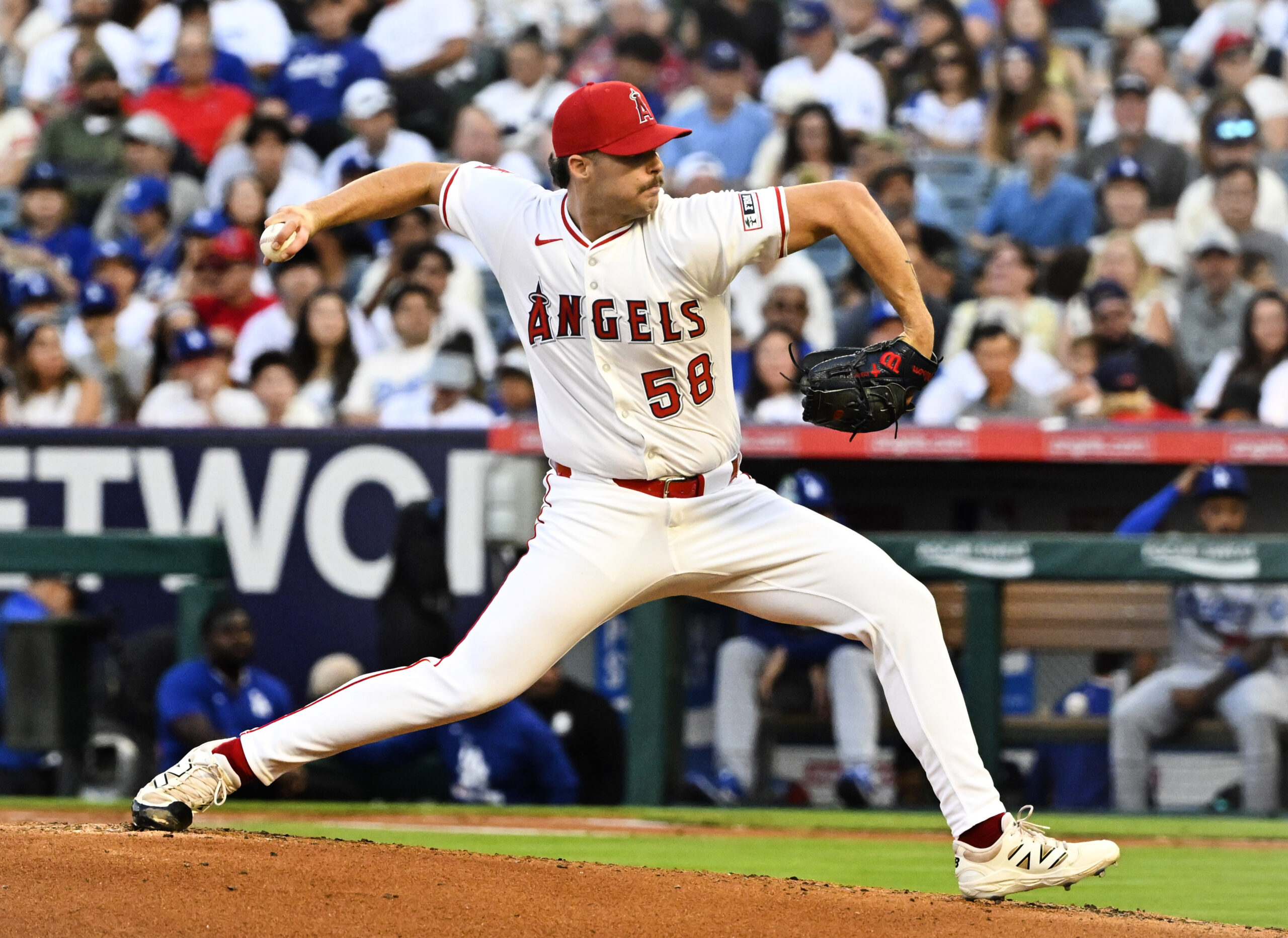 Angels starting pitcher Victor Mederos throws to the plate during...