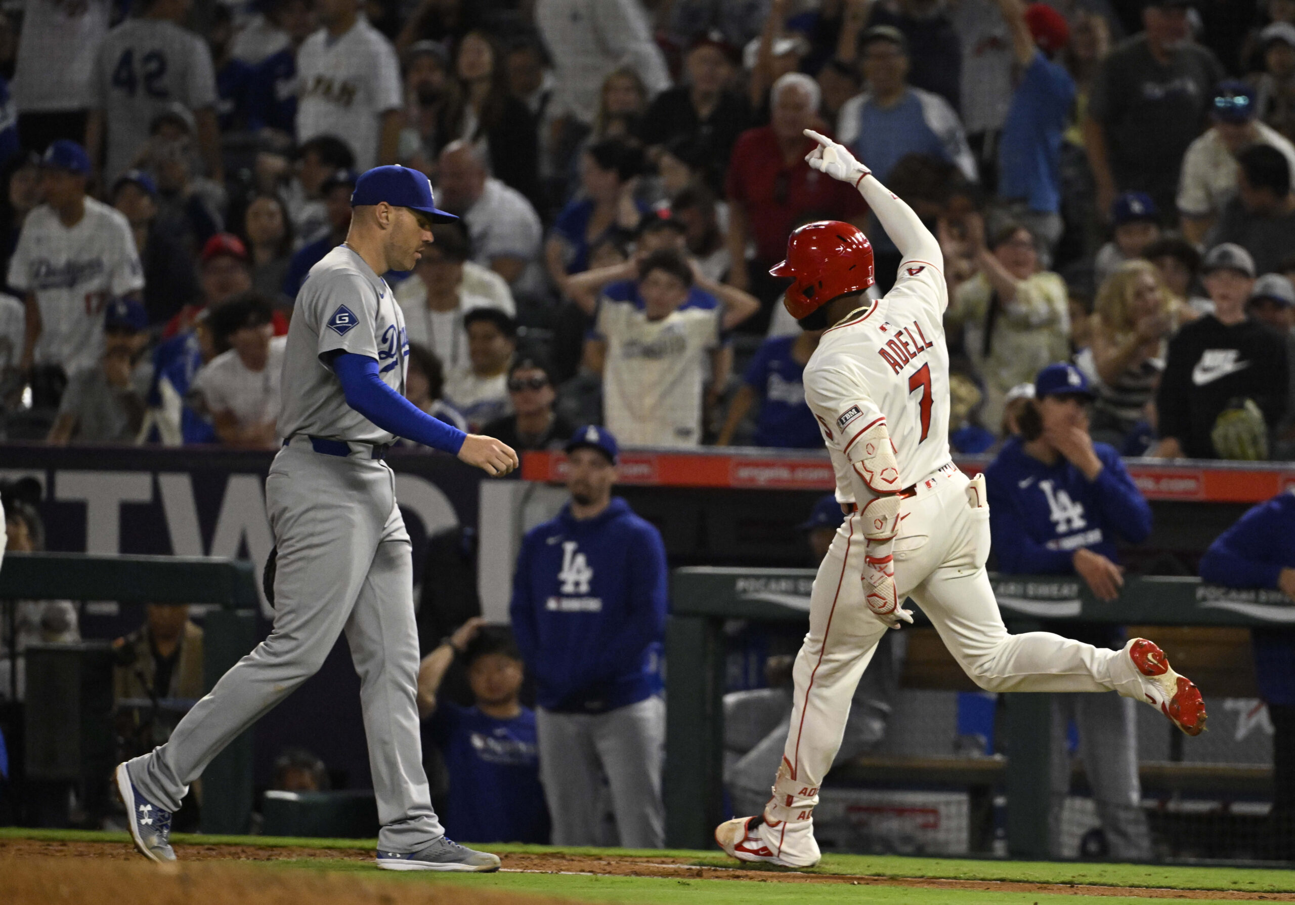 The Angels’ Jo Adell celebrates after hitting a walk-off RBI...