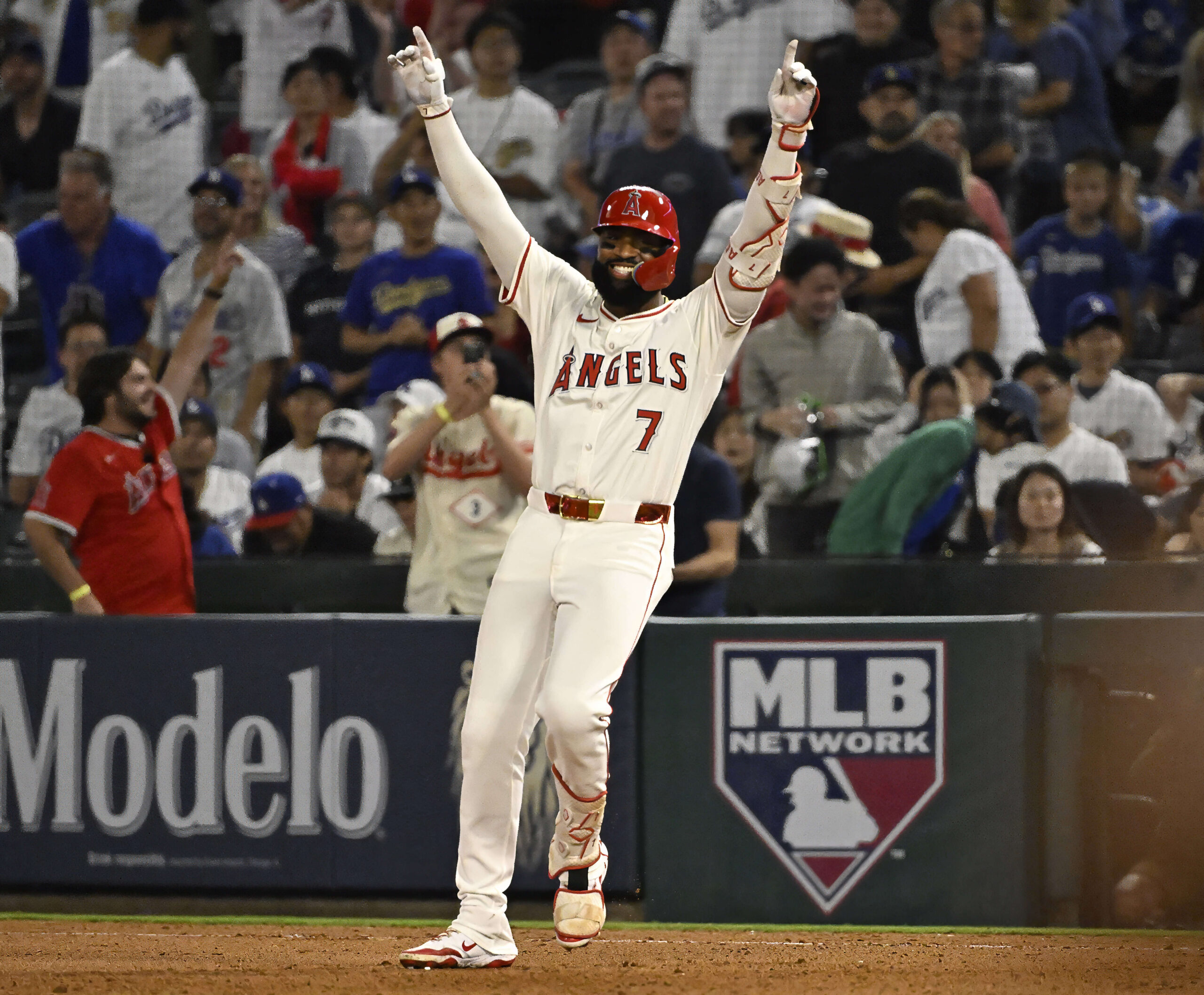 The Angels’ Jo Adell celebrates after hitting a walk-off RBI...