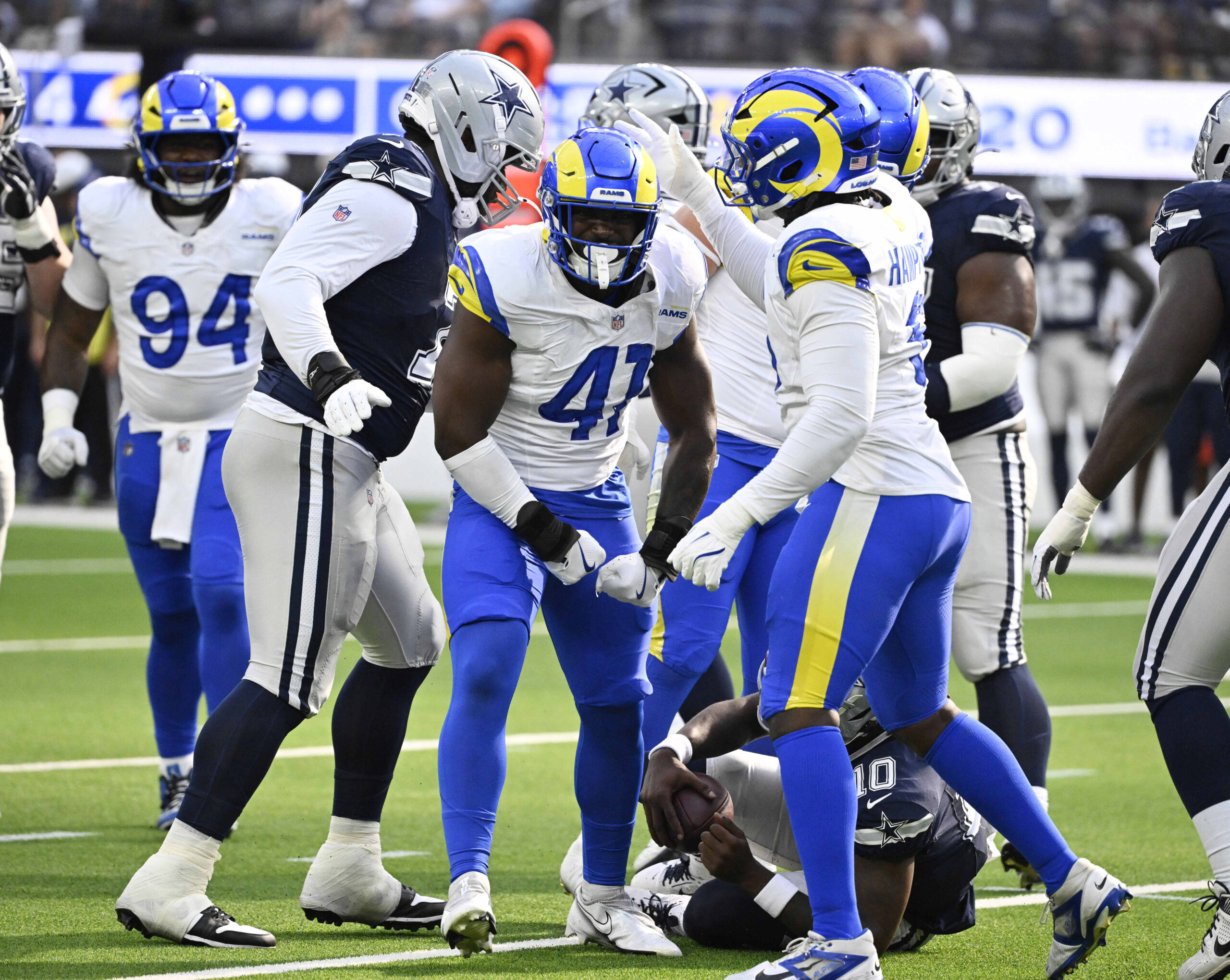Linebacker Josaiah Stewart #41 of the Rams reacts after sacking...