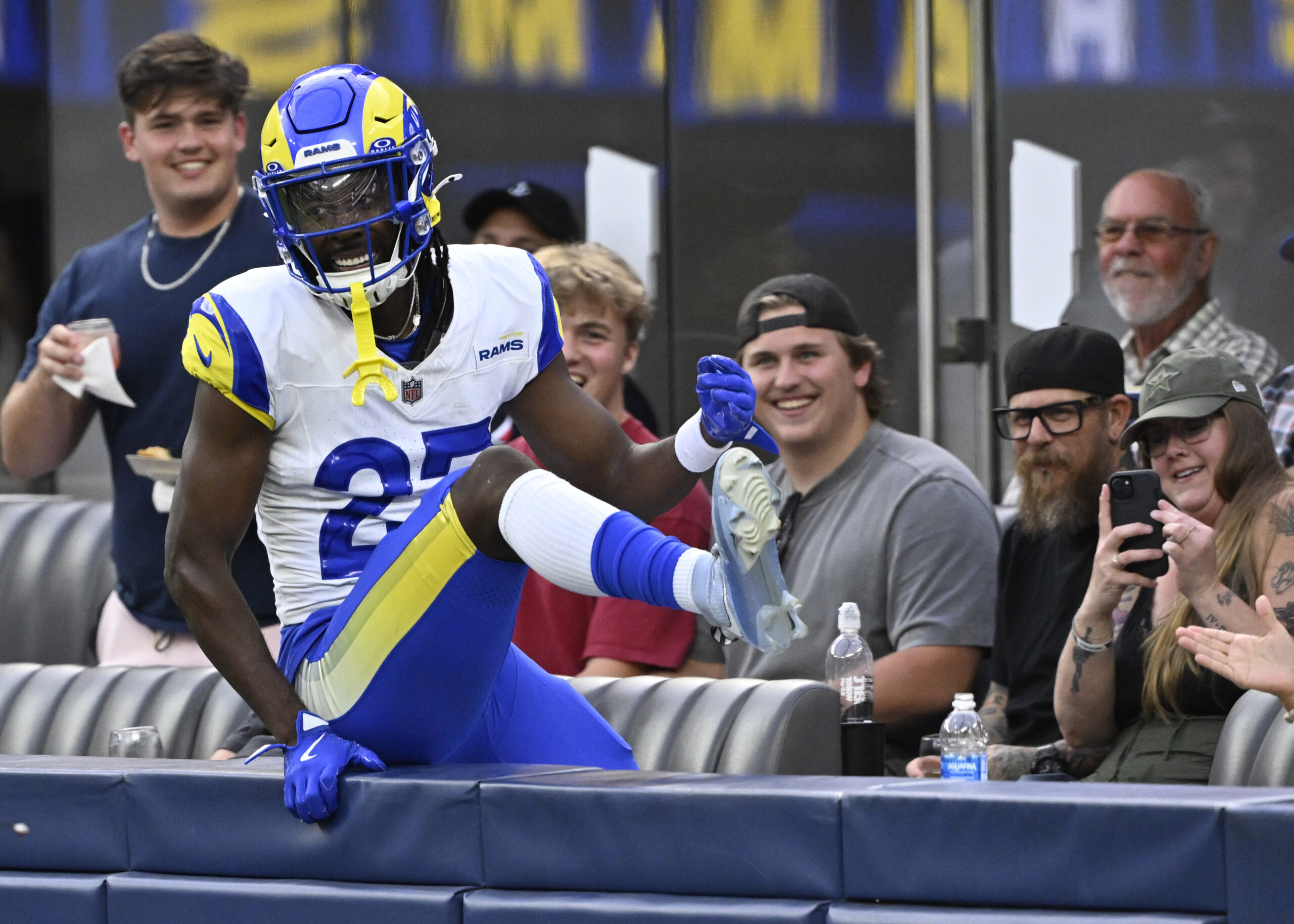 Cornerback A.J. Green #27 of the Rams reacts after falling...