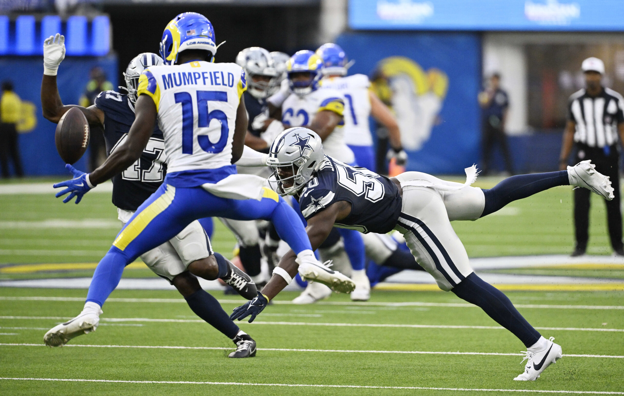 Wide receiver Konata Mumpfield #15 of the Rams juggles and...