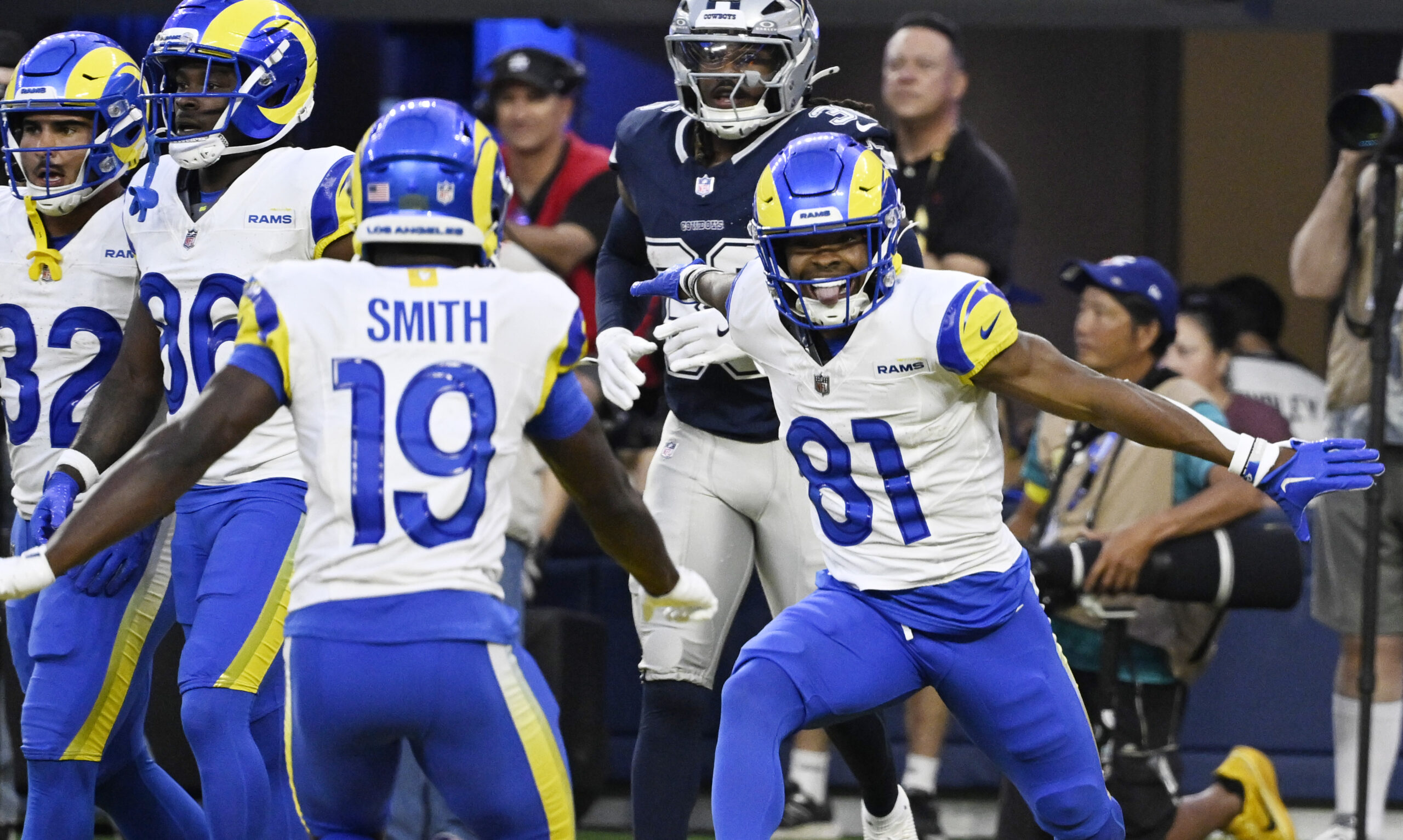 Wide receiver Brennan Presley #81 of the Rams rects after...