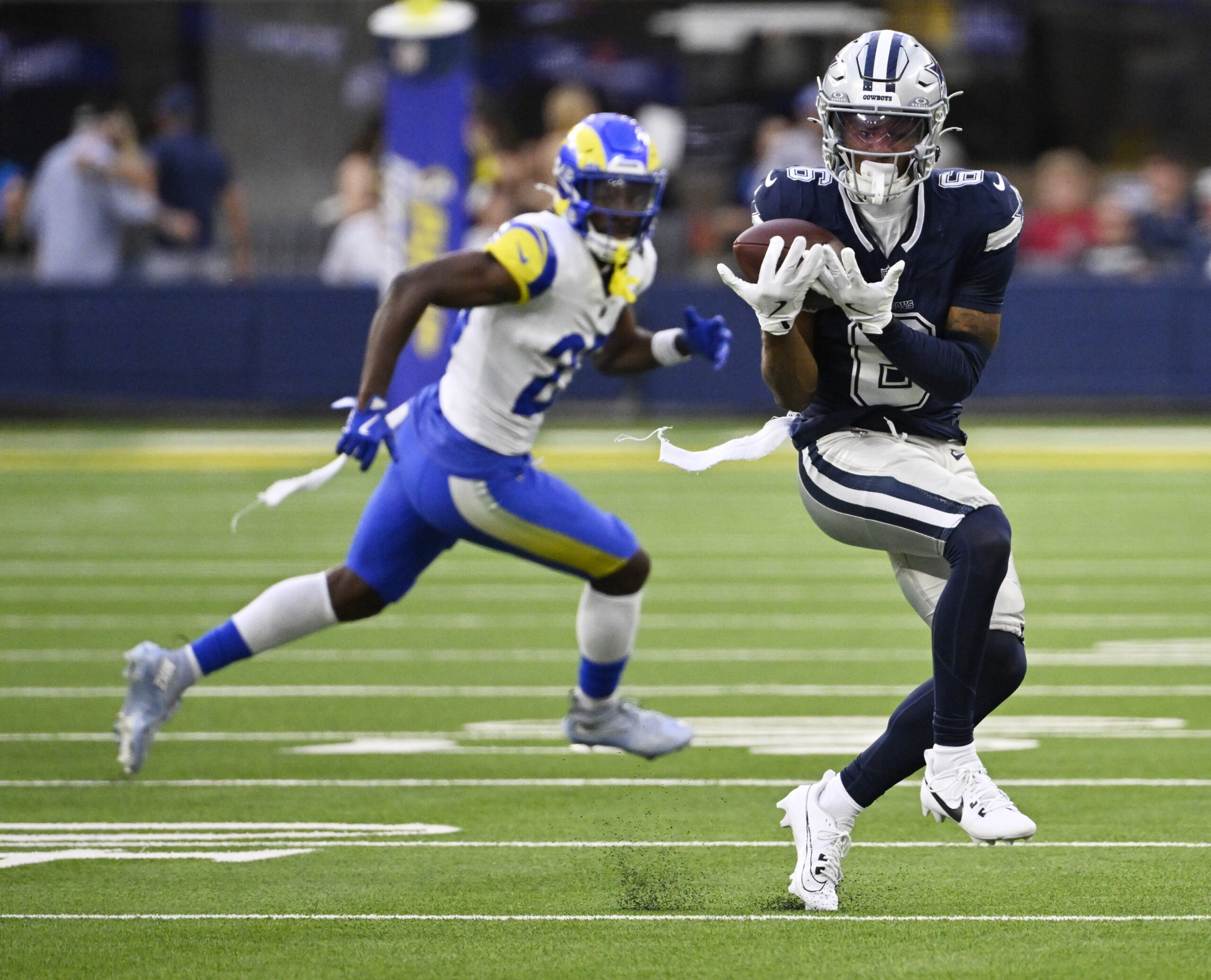 Wide receiver Josh Kelly #6 of the Dallas Cowboys catches...