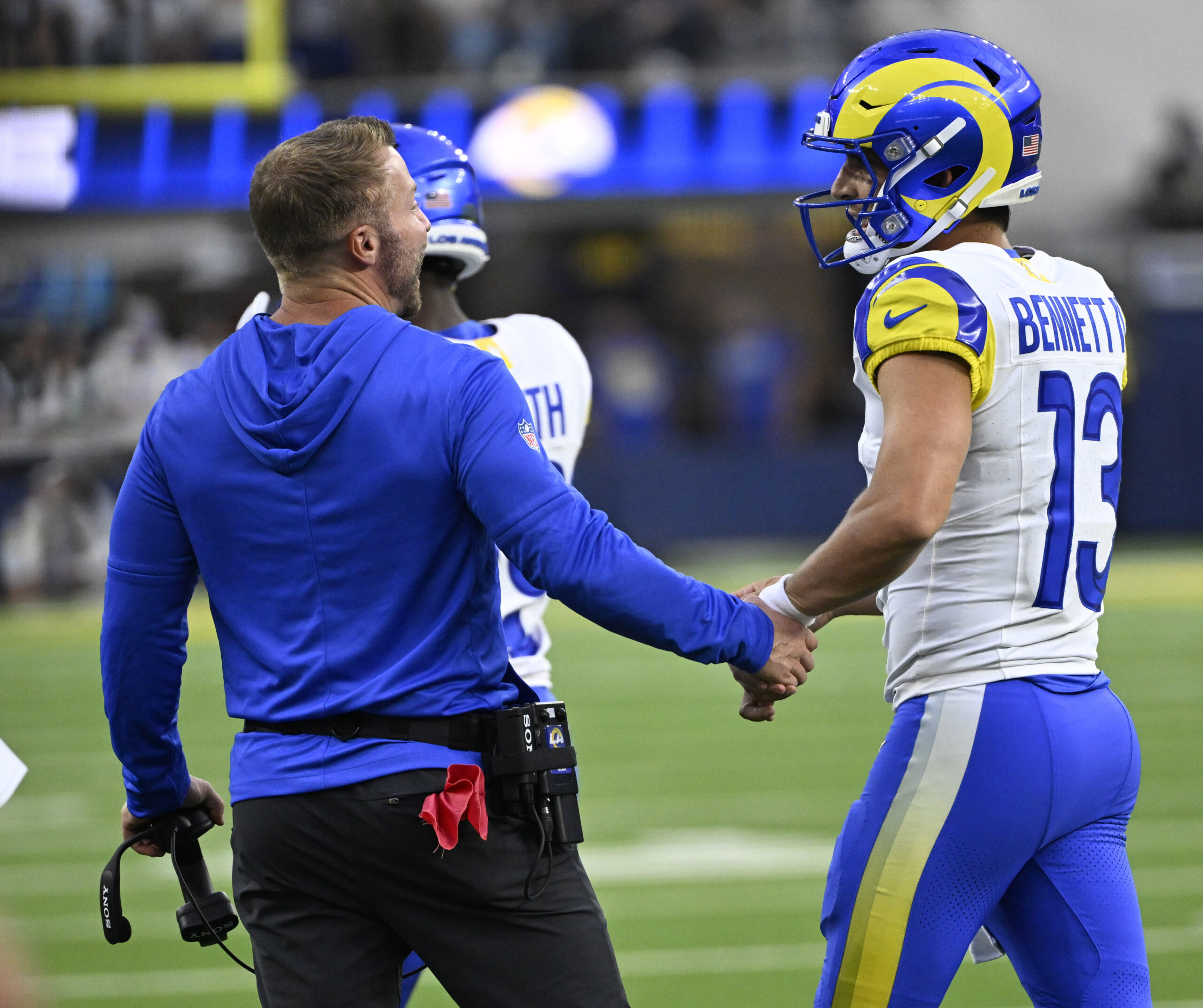 Head coach Sean McVay with quarterback Stetson Bennett IV #13...