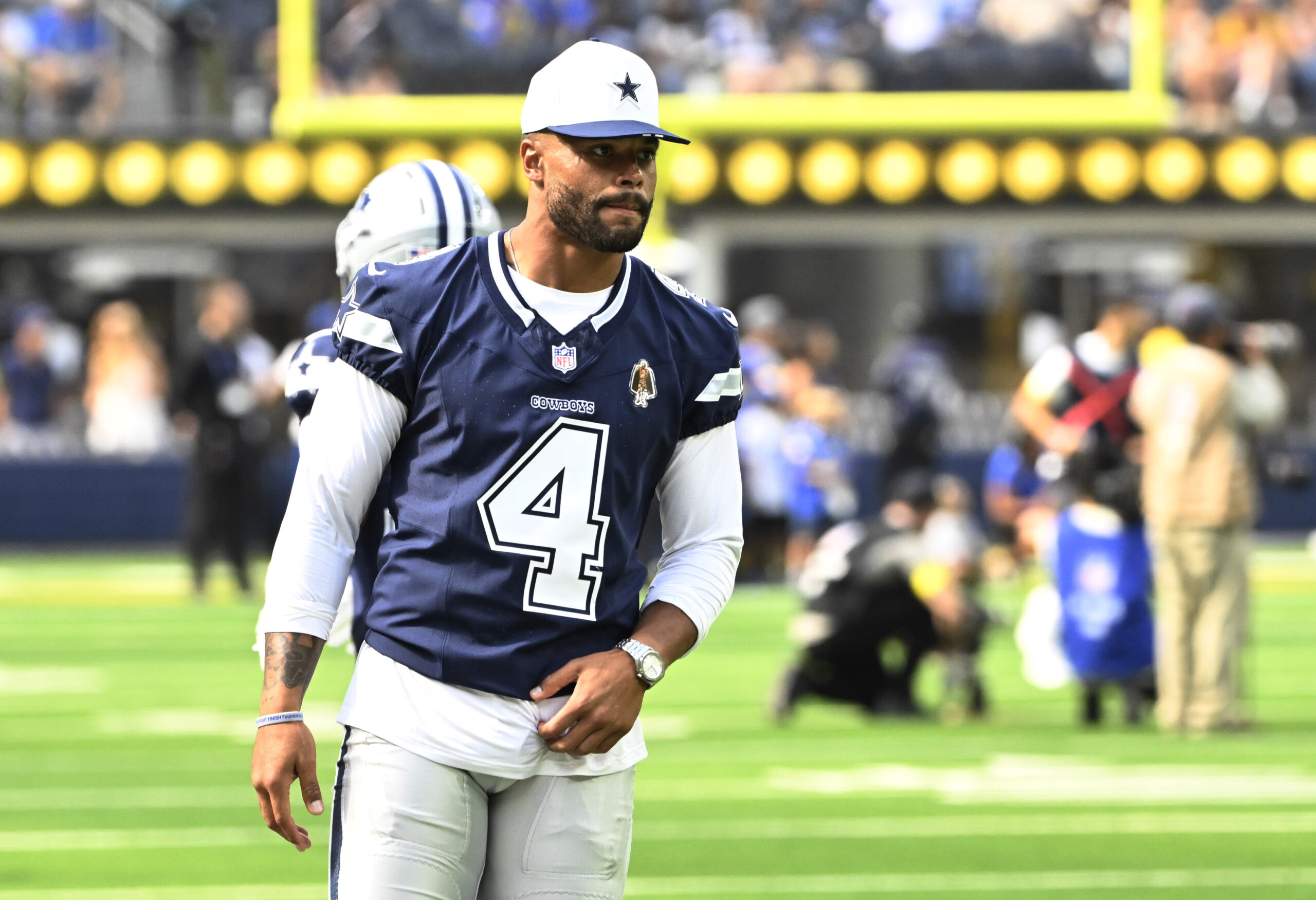 Quarterback Dak Prescott #4 of the Dallas Cowboys prior to...