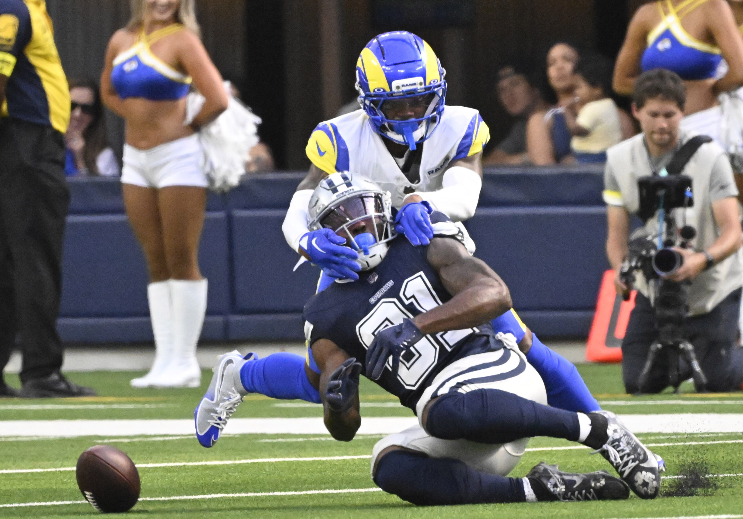 Cornerback Shaun Jolly #24 of the Rams breaks up a...