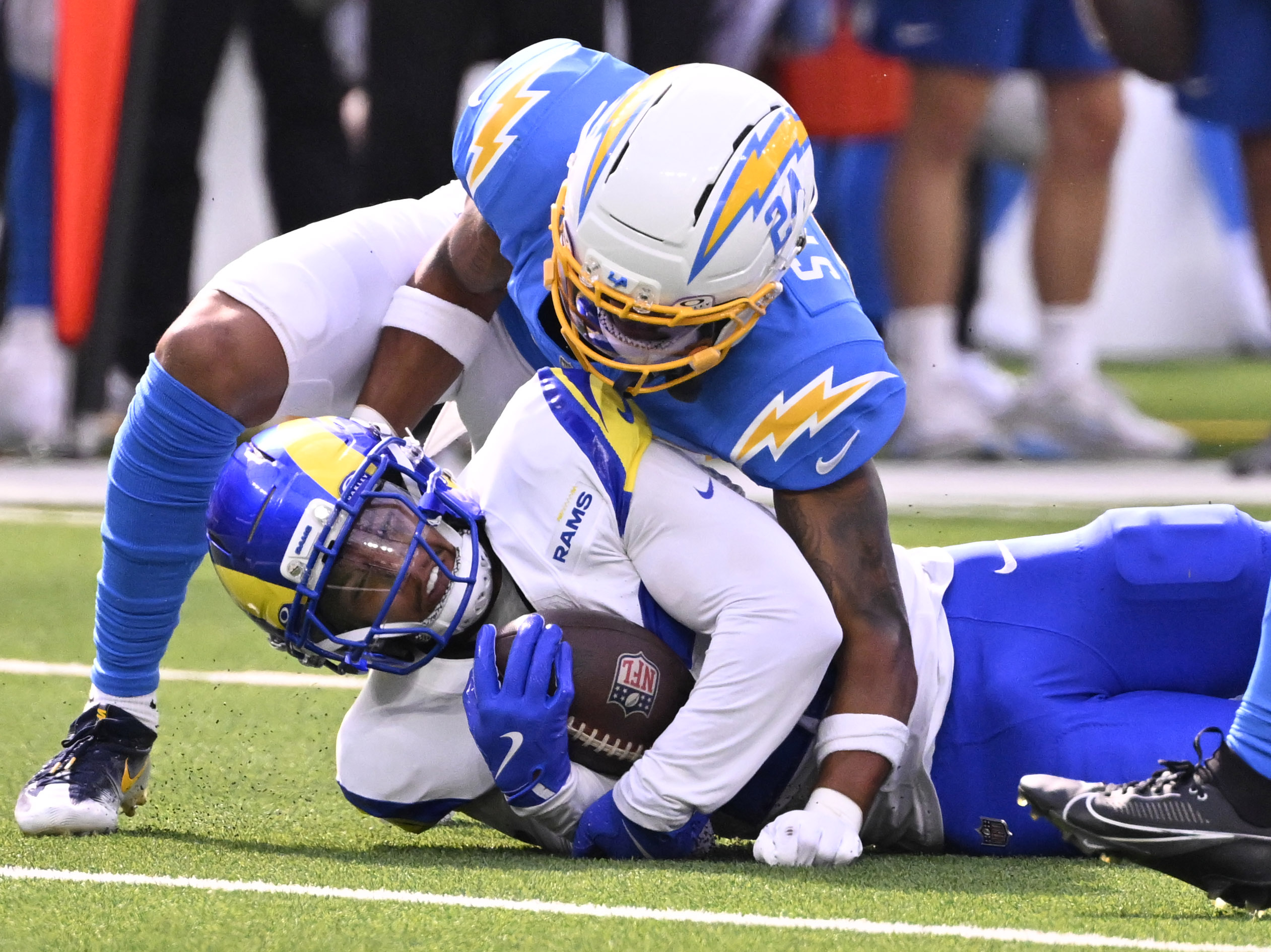 Running back Blake Corum #22 of the Rams runs for...