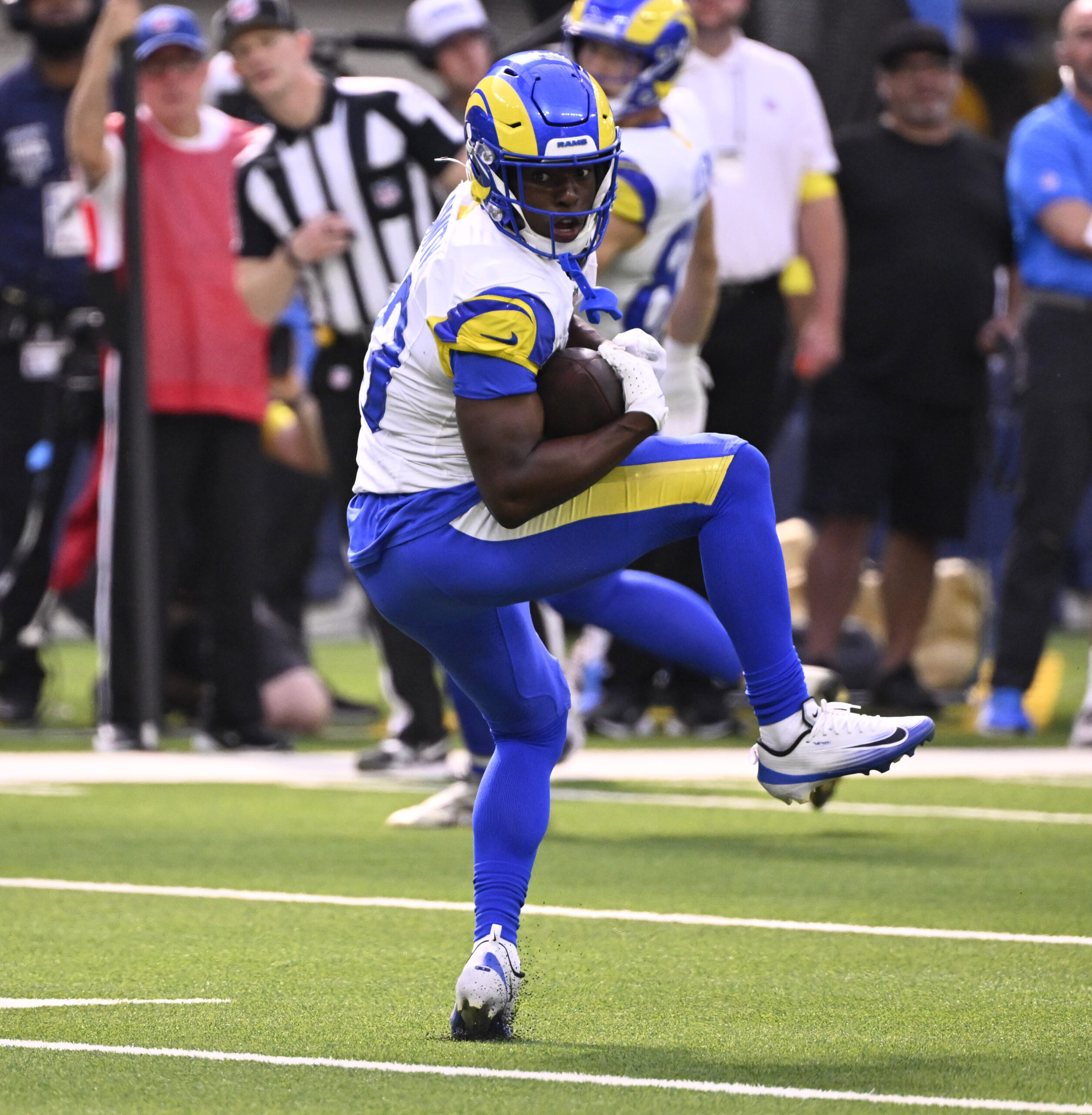 Wide receiver Xavier Smith #19 of the Rams catches pass...