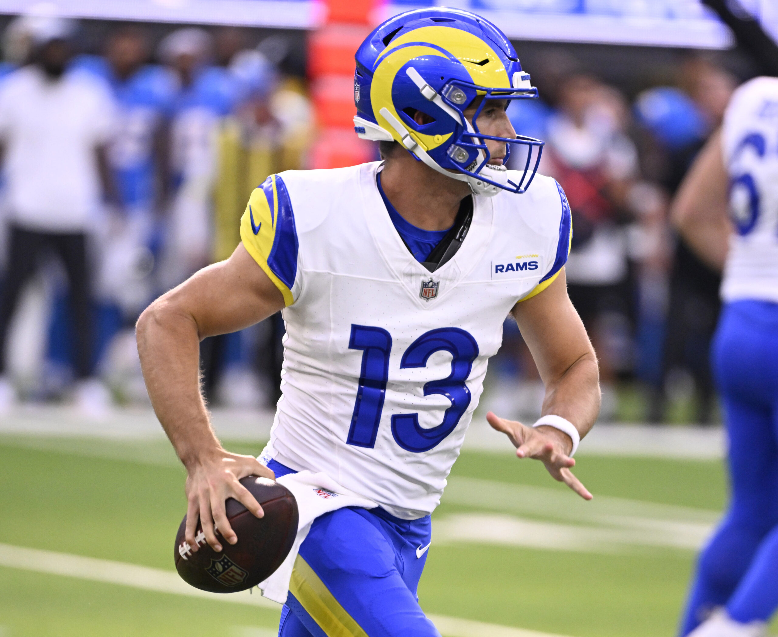 Quarterback Stetson Bennett IV #13 of the Rams scrambles against...