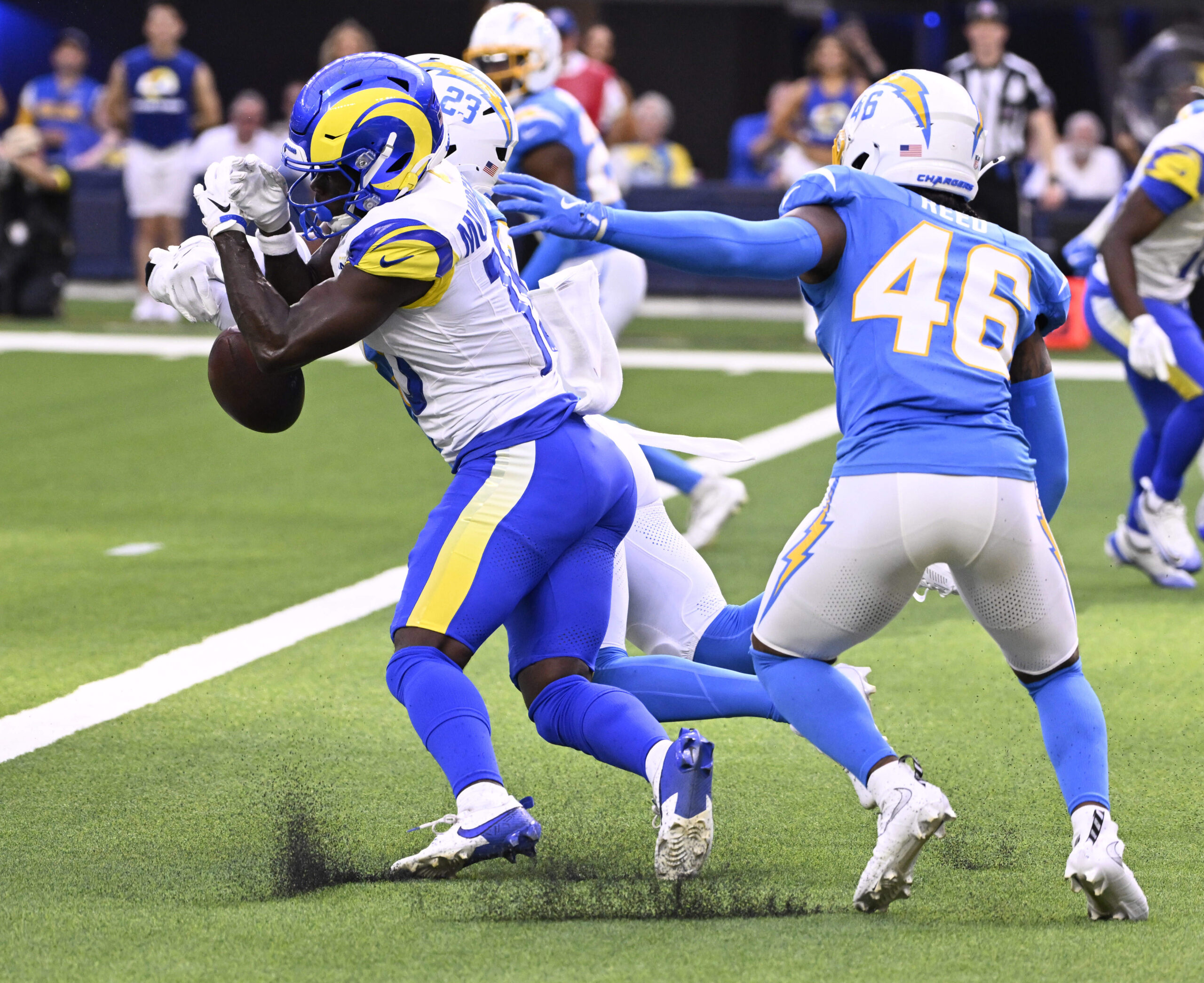 Safety Tony Jefferson #23 of the Chargers break up a...