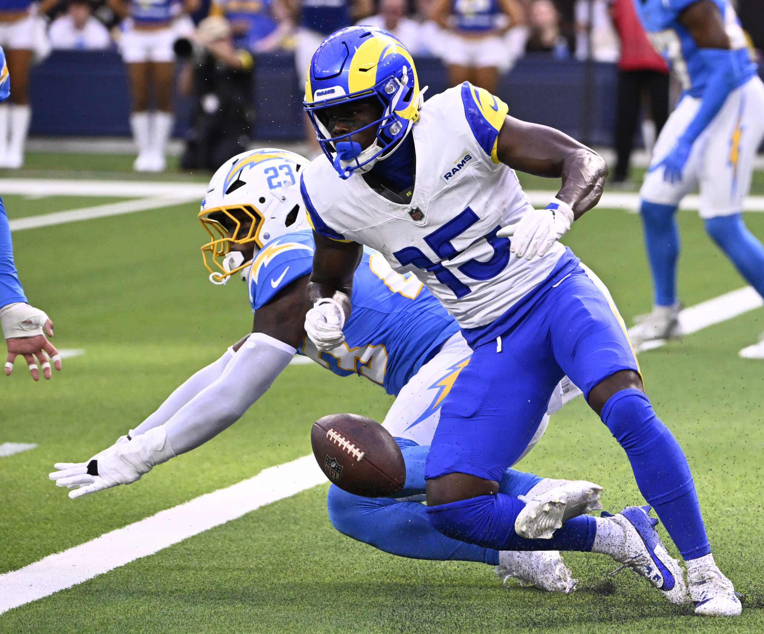 Safety Tony Jefferson #23 of the Chargers break up a...