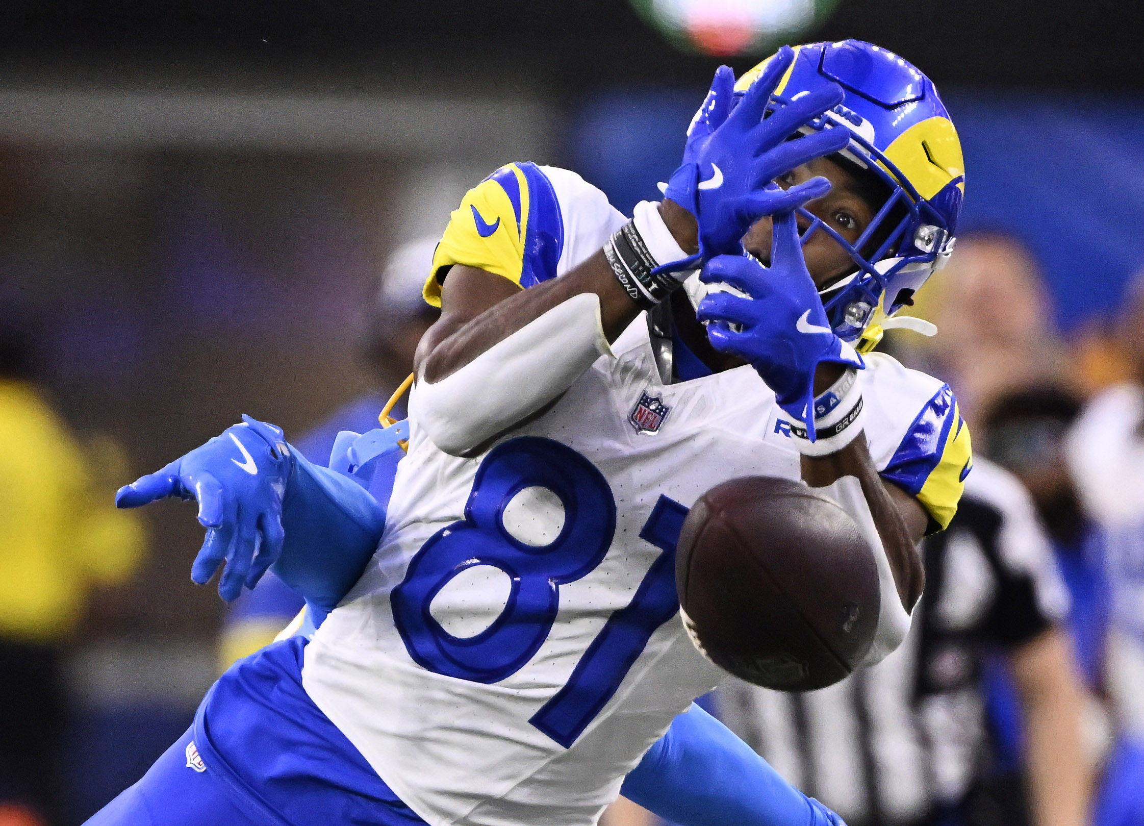 Wide receiver Brennan Presley #81 of the Rams drops a...