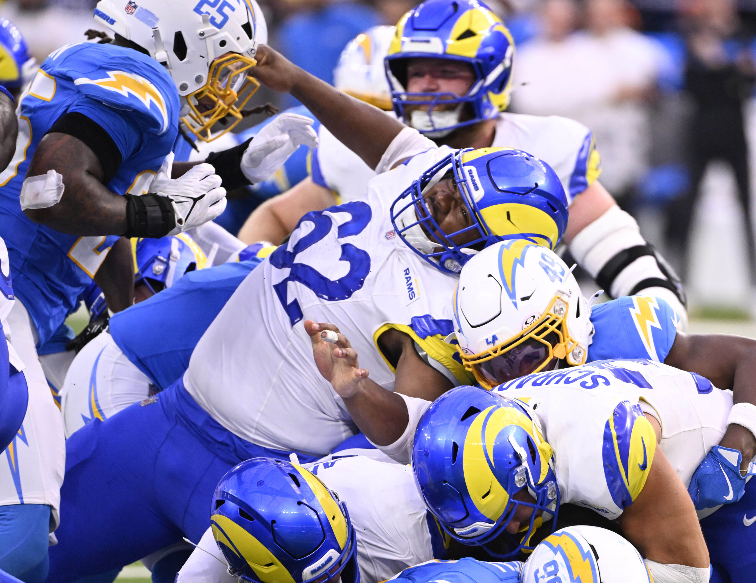 Center Willie Lampkin IV #62 of the Rams injured as...