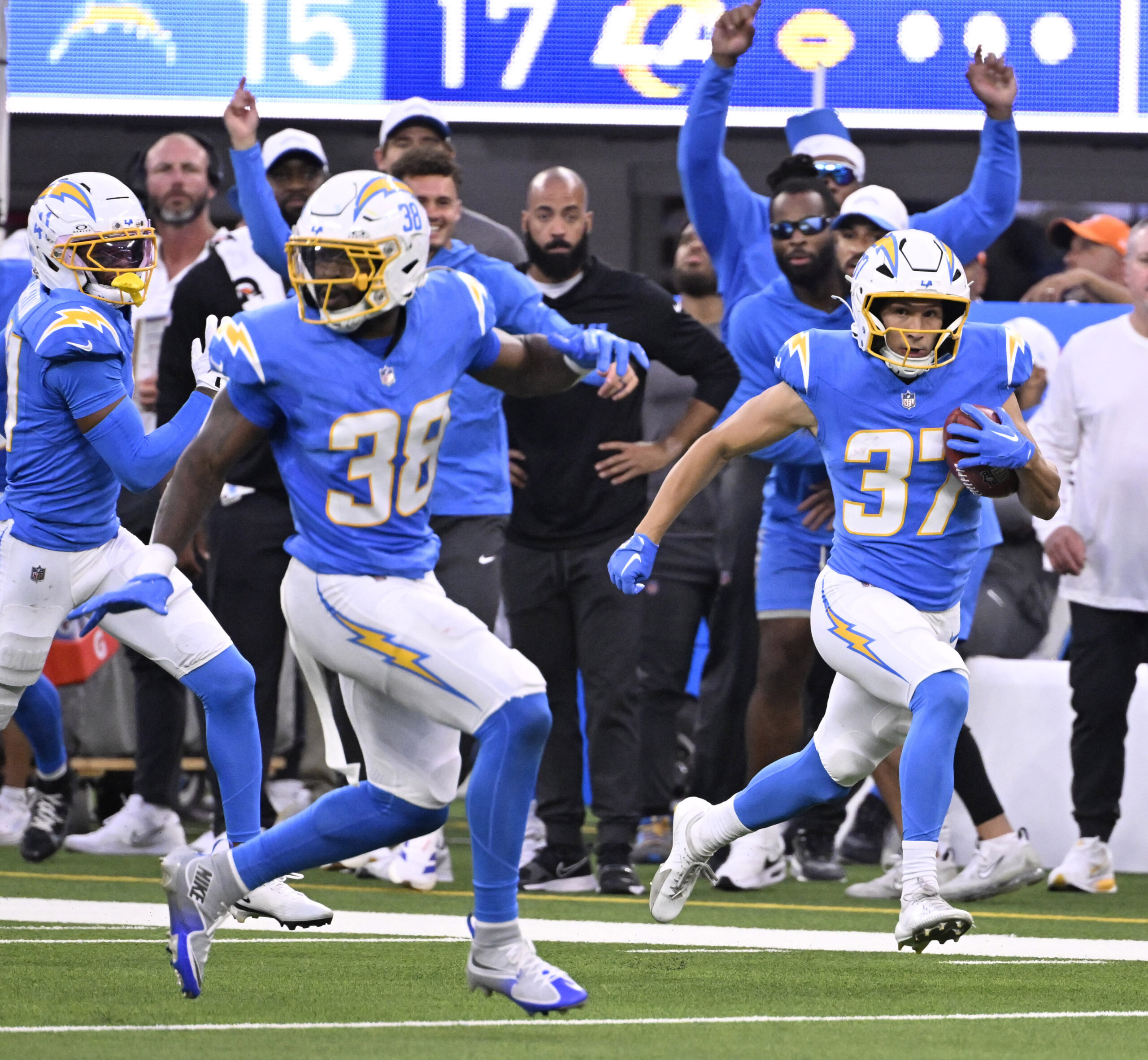 Wide receiver Luke Grimm #37 of the Chargers runs a...