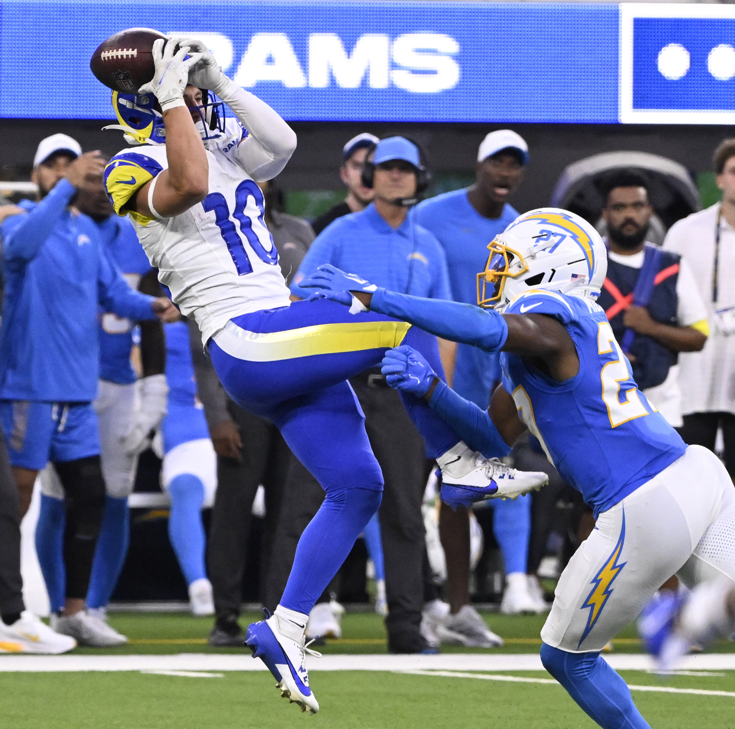Wide receiver Britain Covey #10 of the Rams drops a...
