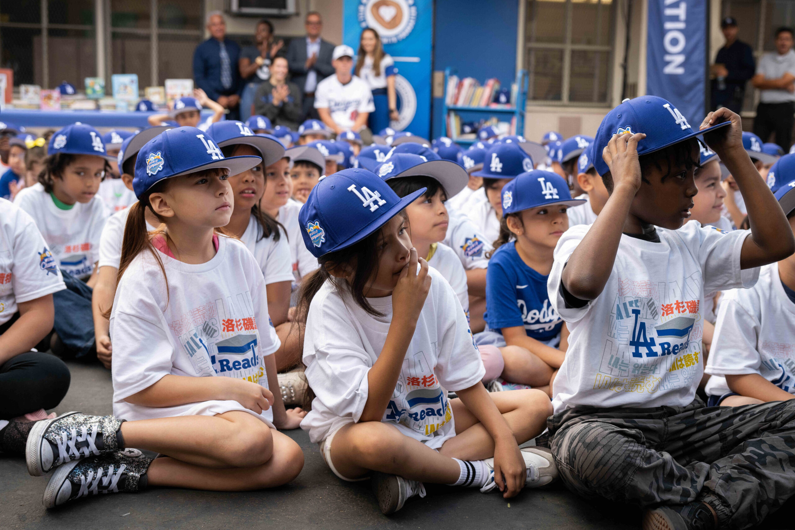 Students pose for pictures with Los Angeles Dodgers Catcher Will...