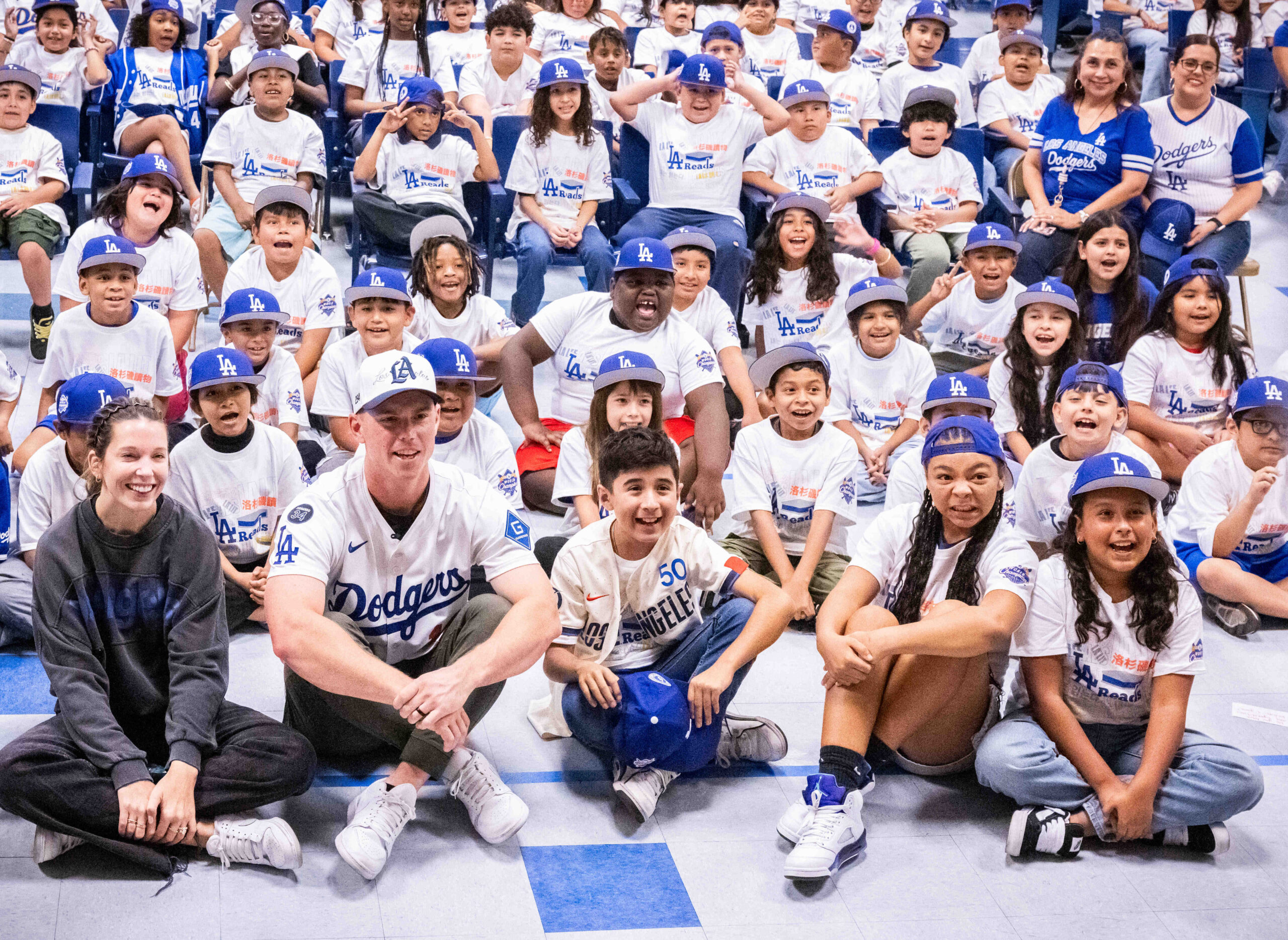 Students pose for pictures with Los Angeles Dodgers Catcher Will...