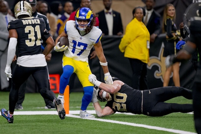 Dec 1, 2024; New Orleans, Louisiana, USA; Los Angeles Rams wide receiver Puka Nacua (17) scores a touchdown against New Orleans Saints linebacker Pete Werner (20) during the second half at Caesars Superdome. Mandatory Credit: Matthew Hinton-Imagn Images Puka Nacua, Rams, Saints