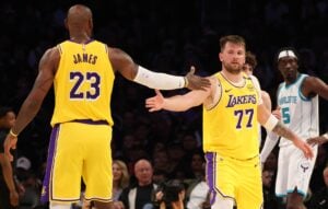 Los Angeles Lakers forward LeBron James (23) and guard Luka Doncic