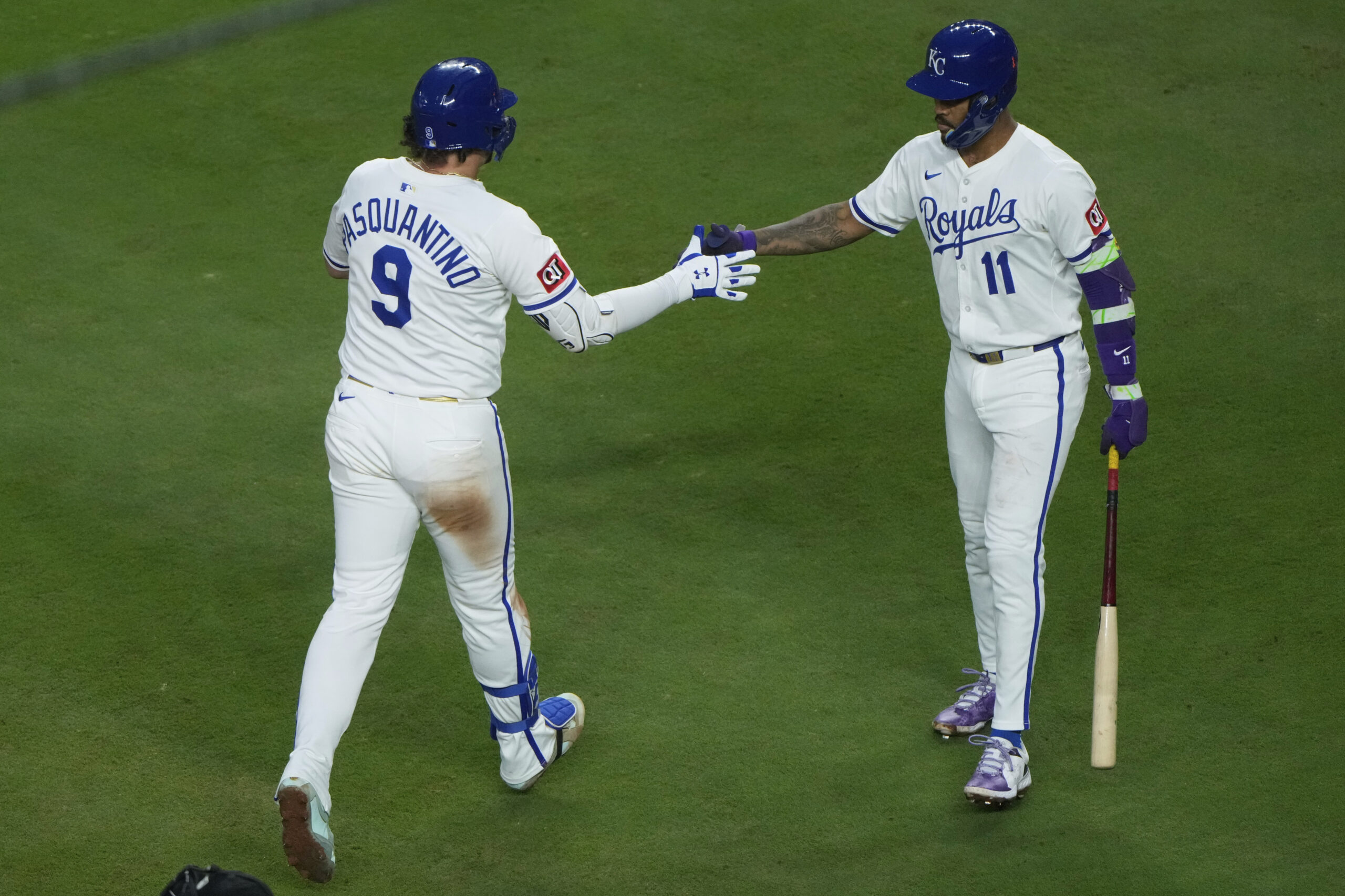 The Kansas City Royals’ Vinnie Pasquantino (9) celebrates with Maikel...