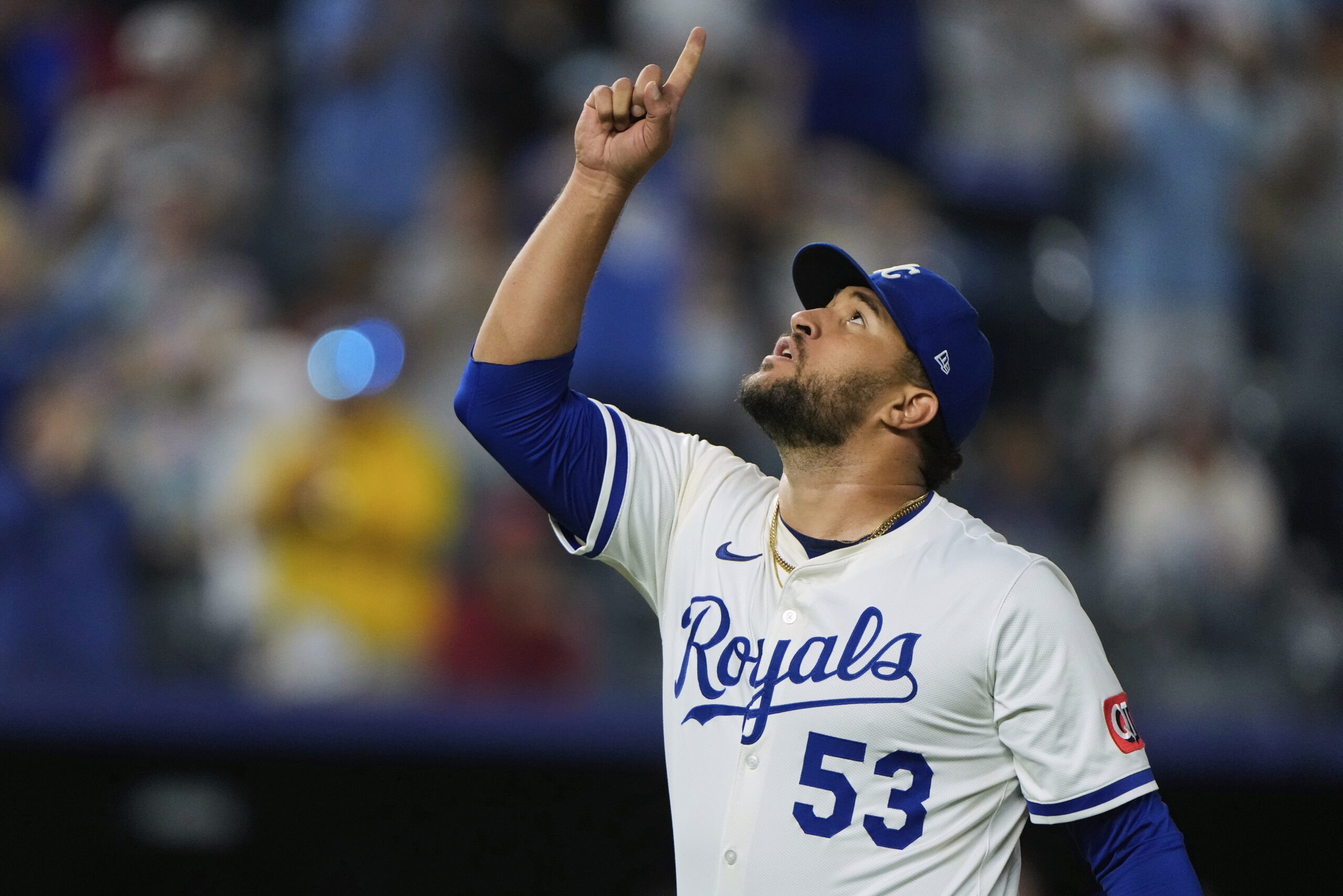 Kansas City Royals relief pitcher Carlos Estevez celebrates after a...