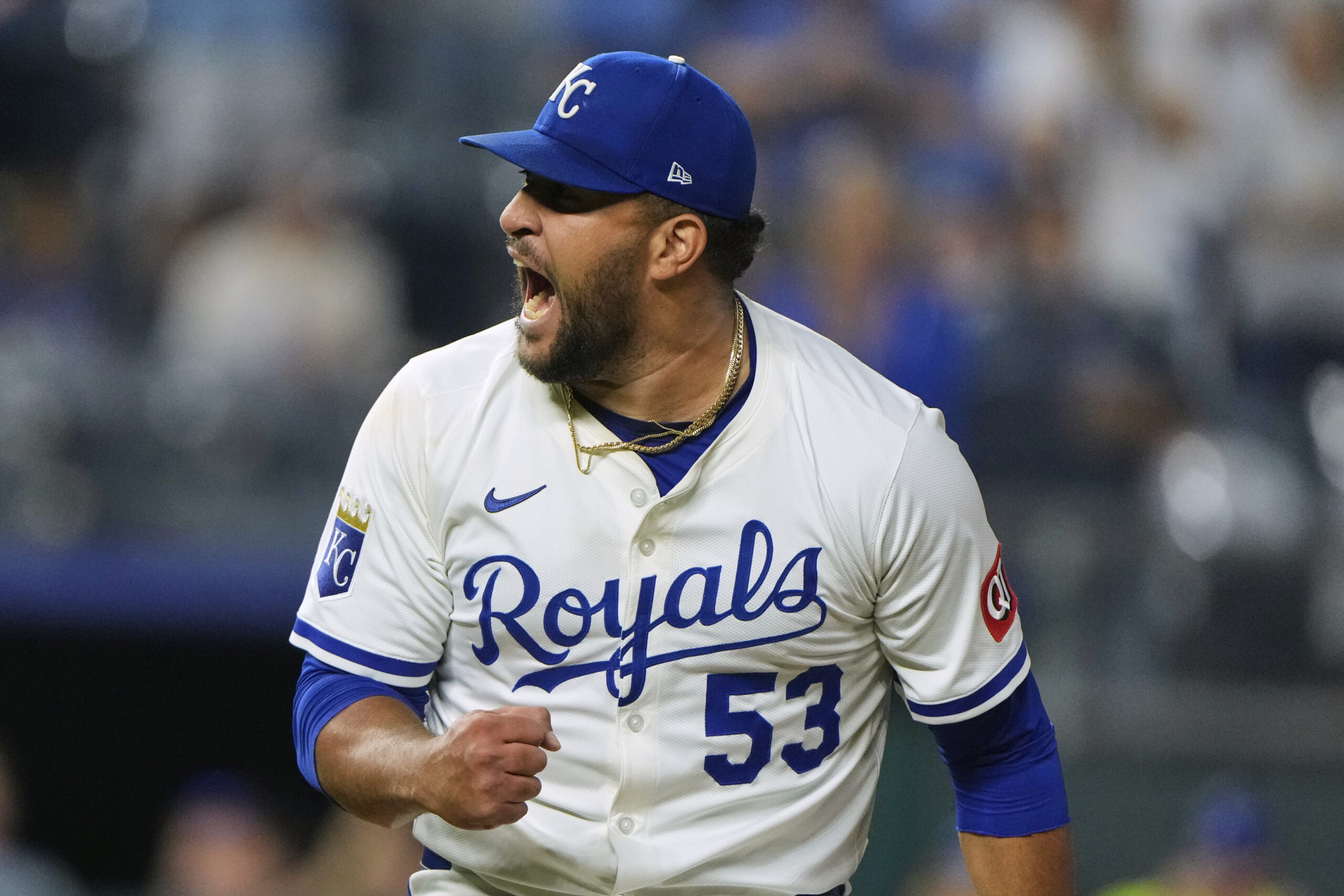 Kansas City Royals relief pitcher Carlos Estevez celebrates after a...