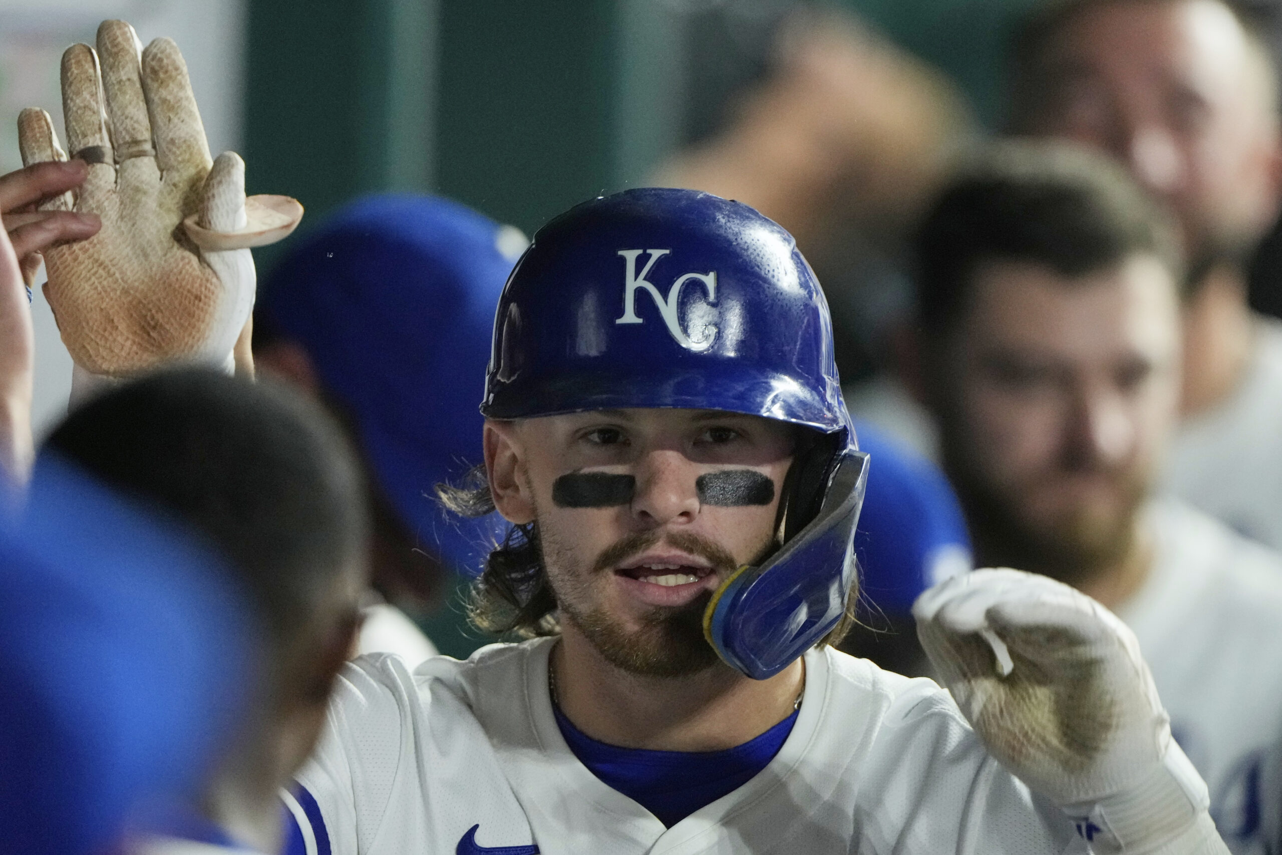 Kansas City Royals’ Bobby Witt Jr. celebrates in the dugout...