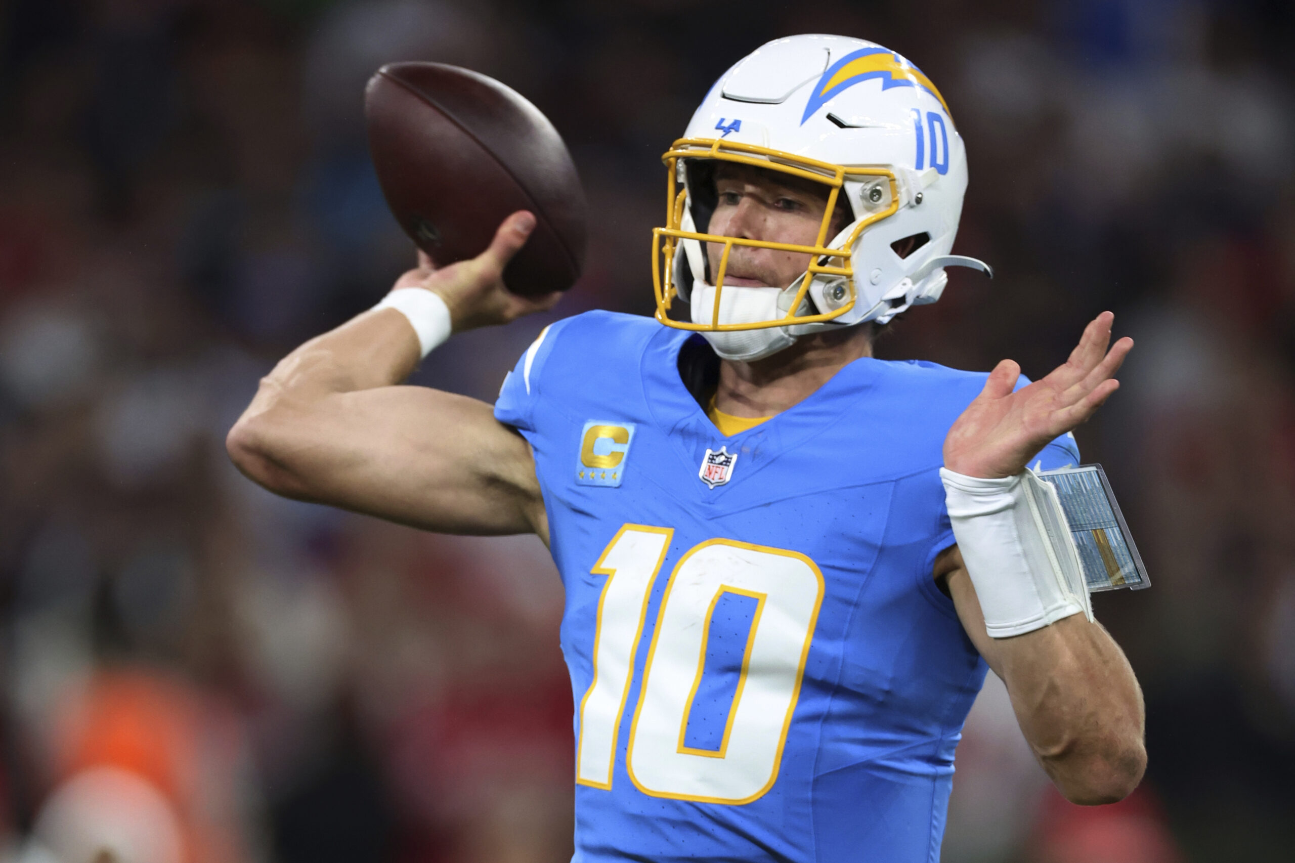 Chargers quarterback Justin Herbert passes against the Kansas City Chiefs...