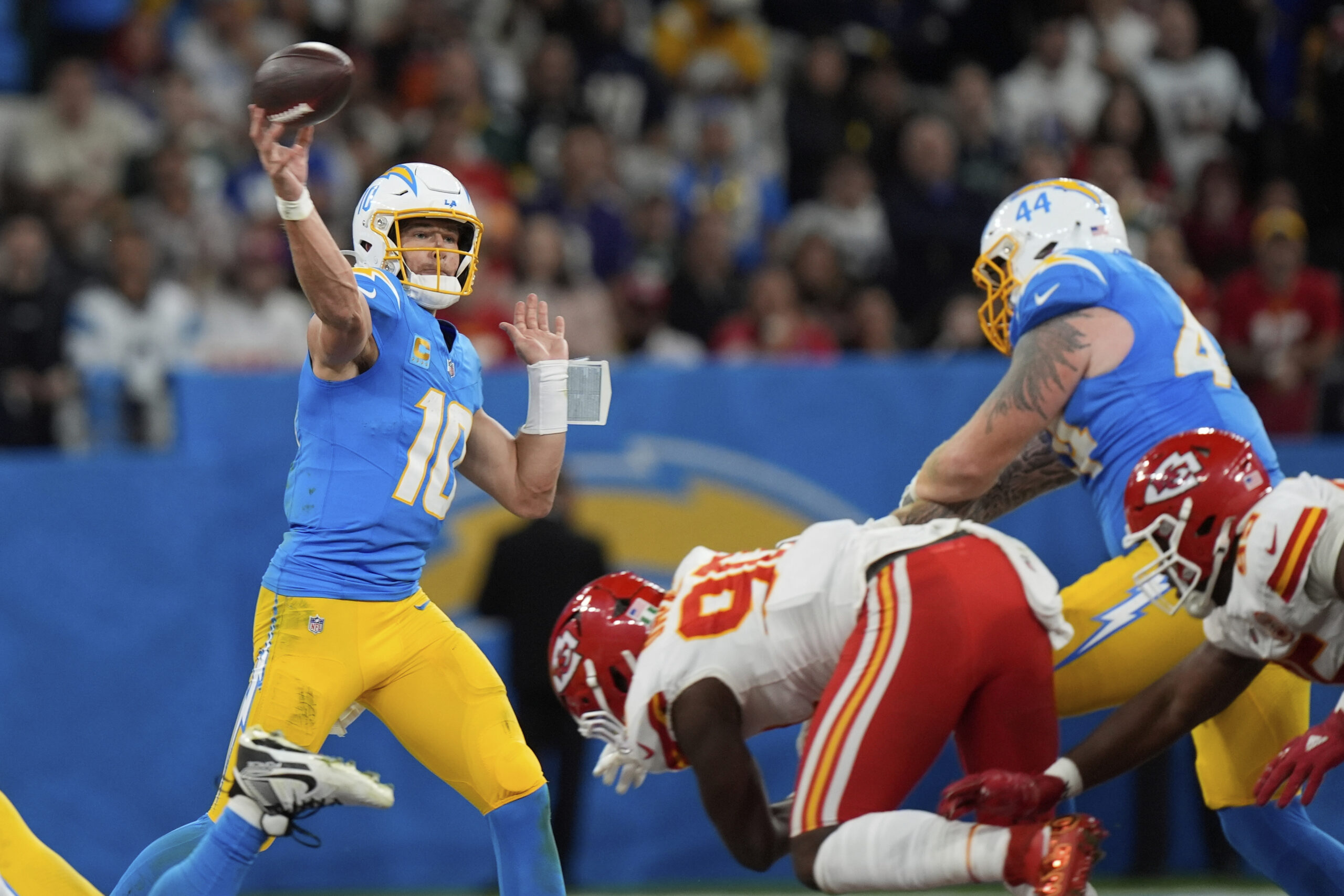 Chargers quarterback Justin Herbert passes against the Kansas City Chiefs...