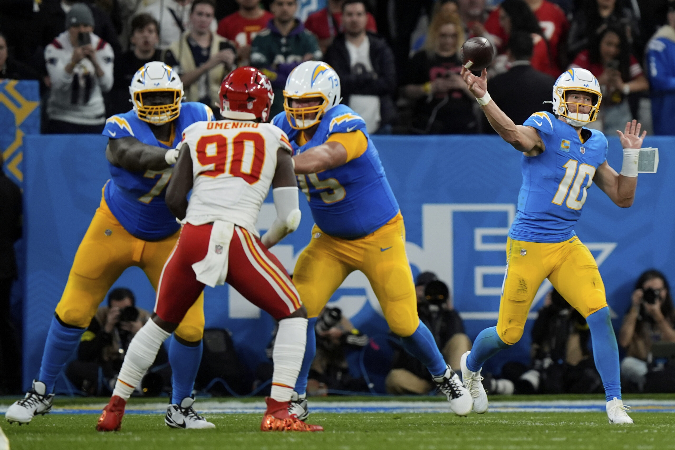 Chargers quarterback Justin Herbert passes against the Kansas City Chiefs...