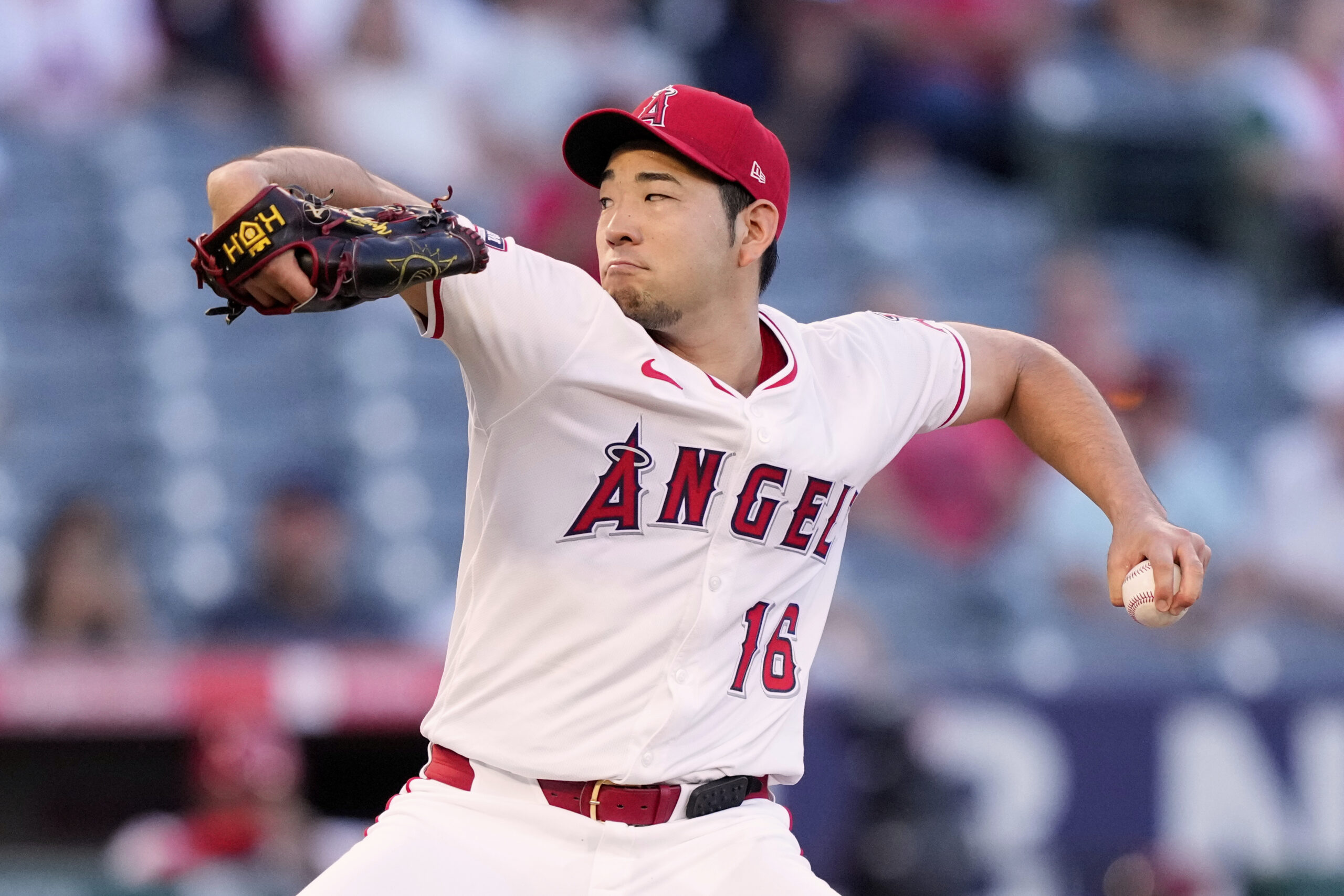 Angels pitcher Yusei Kikuchi throws to the plate during the...