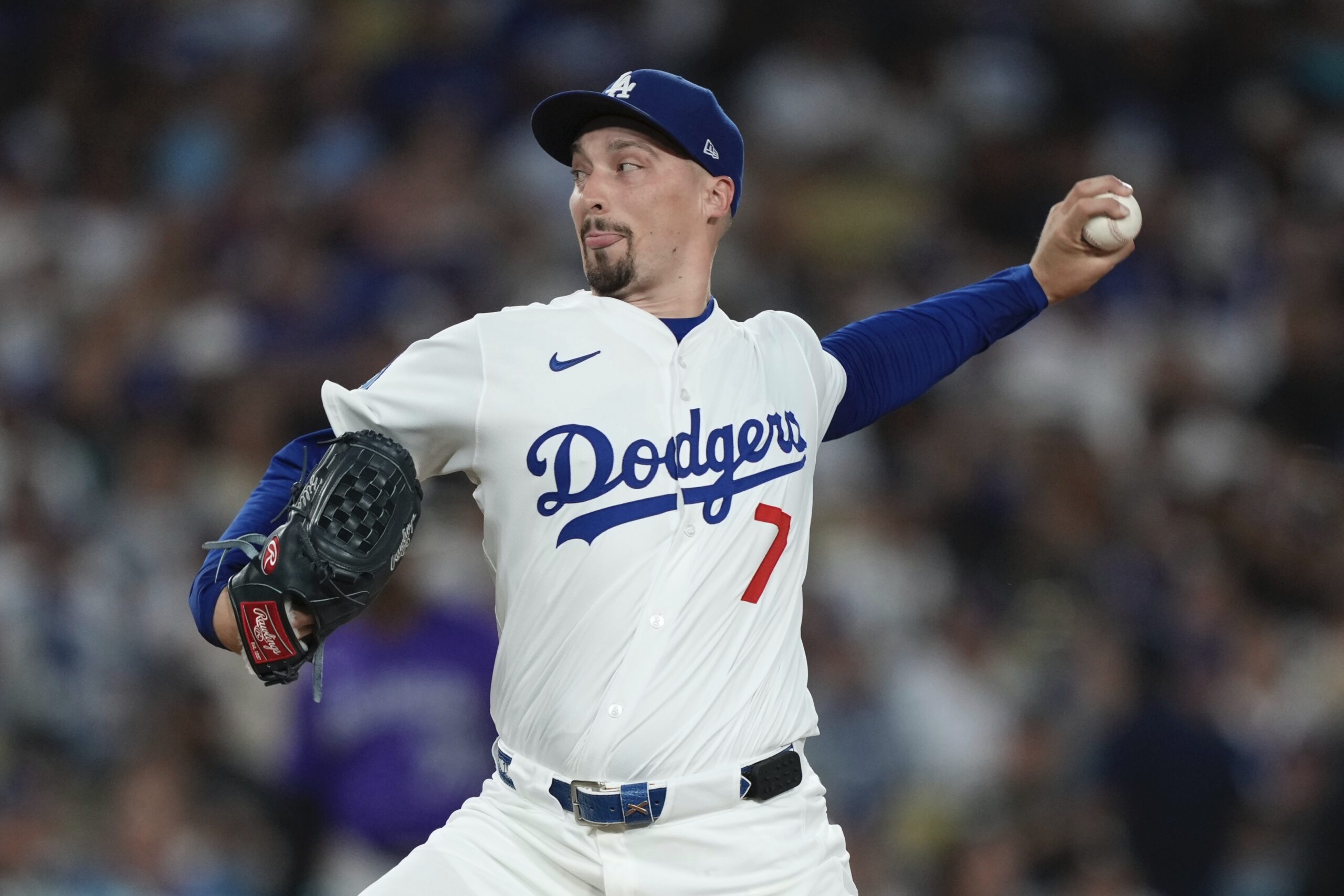 Dodgers starting pitcher Blake Snell throws to the plate during...