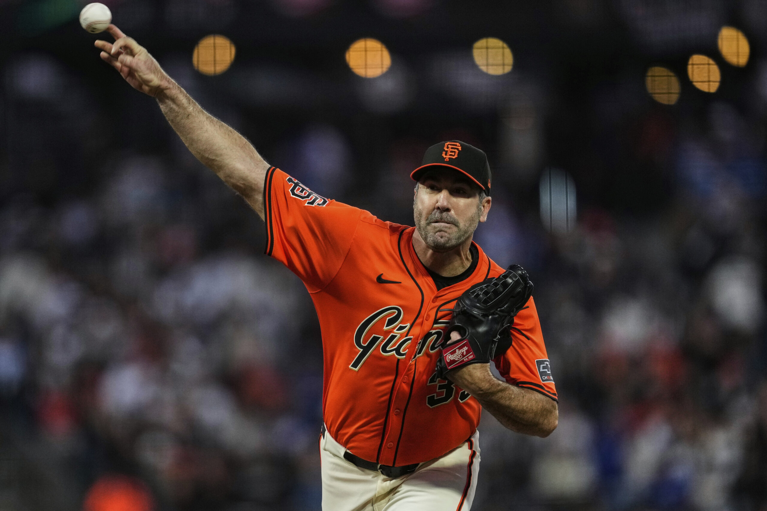 San Francisco Giants starting pitcher Justin Verlander throws to the...