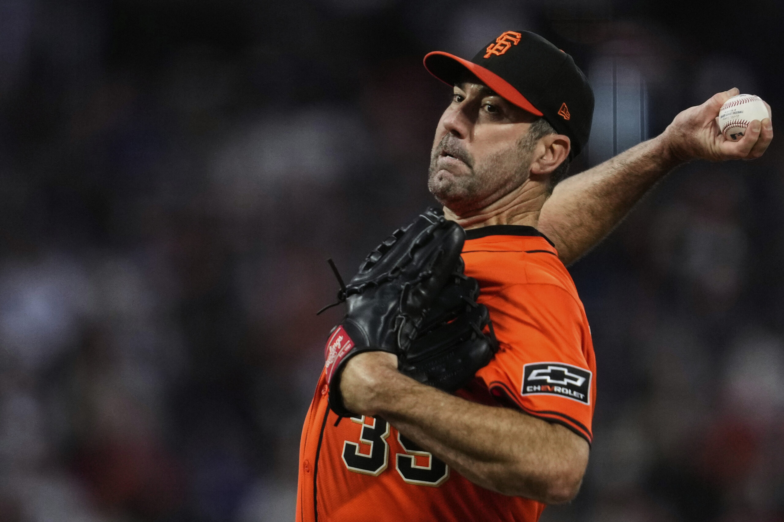 San Francisco Giants starting pitcher Justin Verlander throws to the...