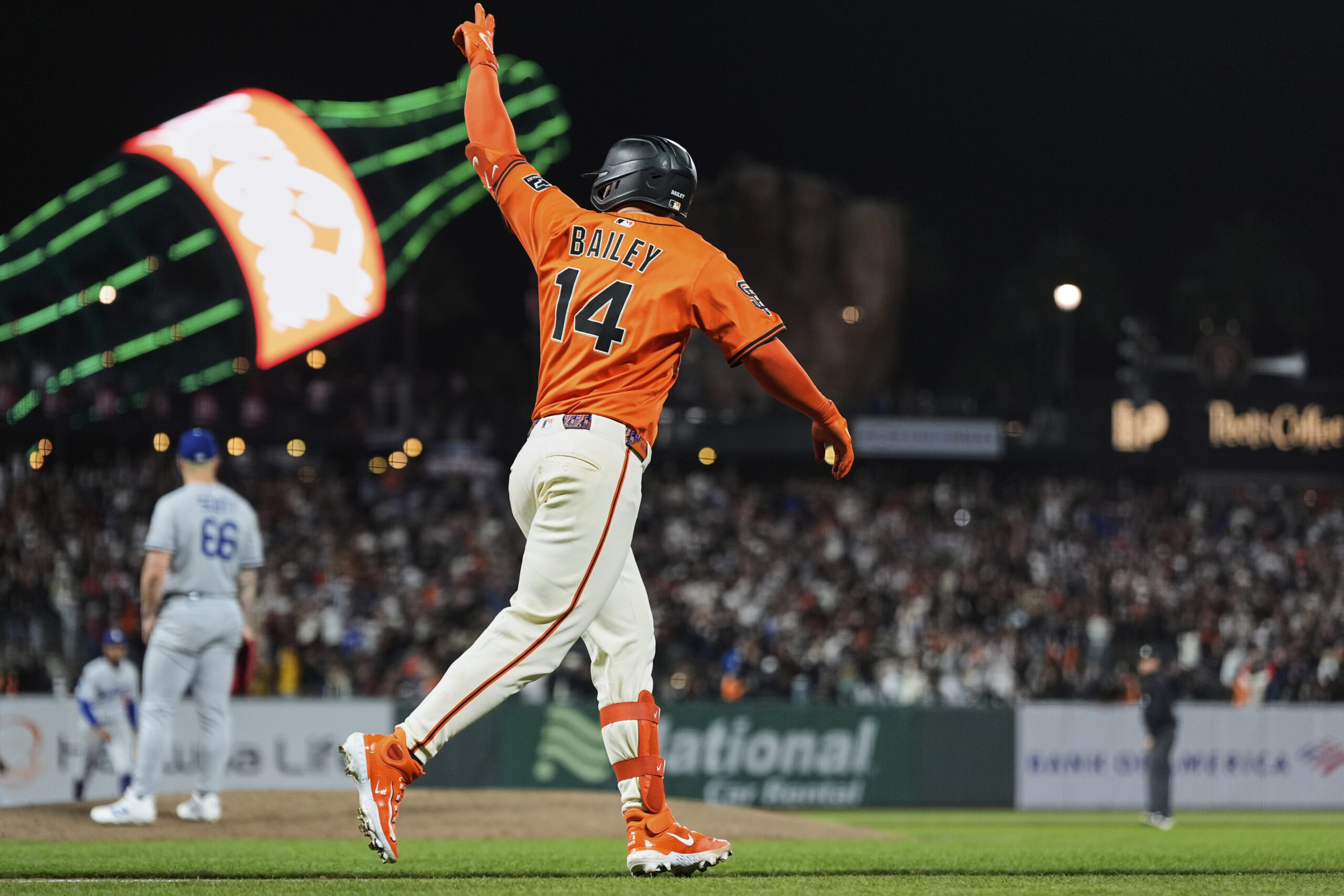 The San Francisco Giants’ Patrick Bailey celebrates as he begins...